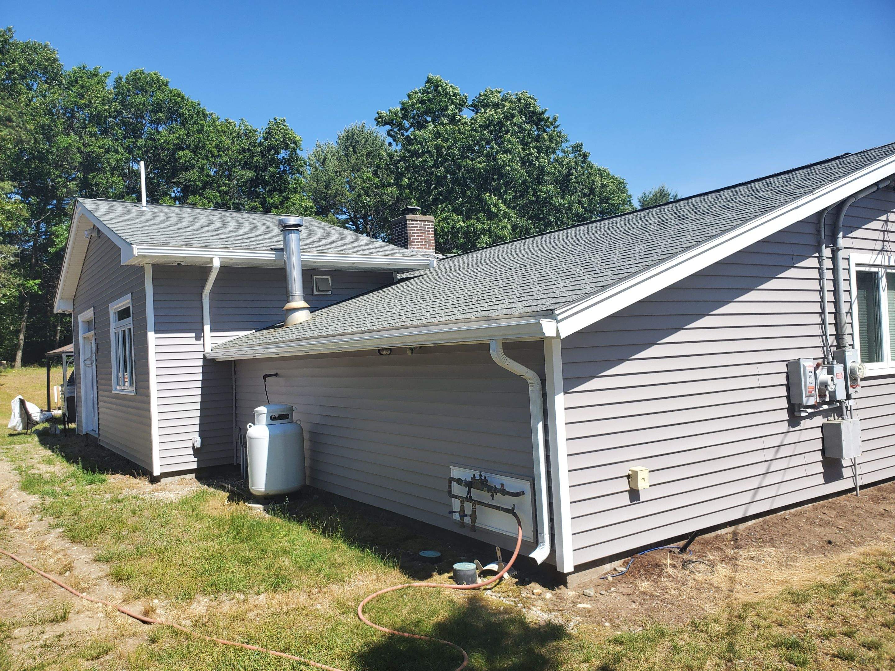 Siding Installation using insulation, PVC trim and vinyl siding by UBrothers Construction