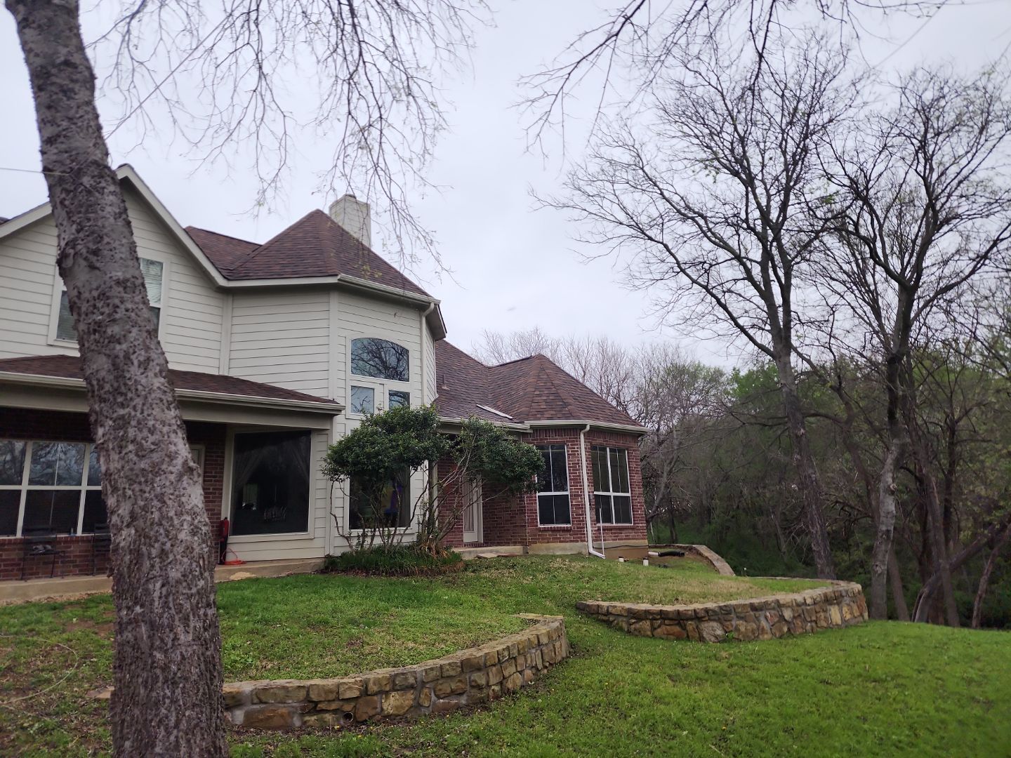 Insurance Claim Roof Paint and Gutters by Tex-Line Roofing