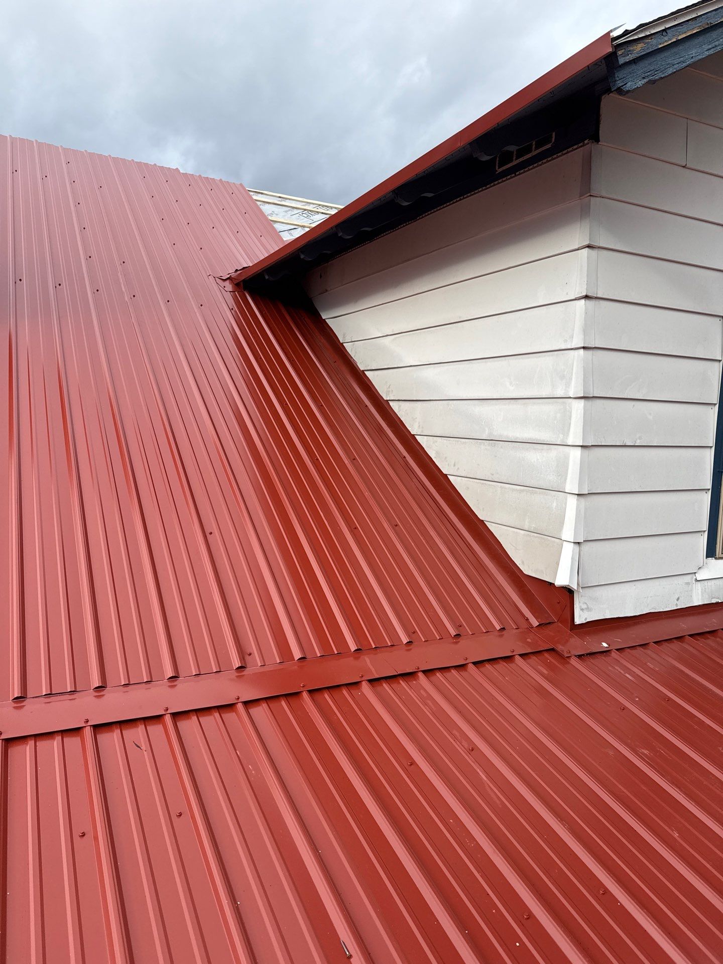 Edward Seal Full Metal Roof Installation by Good Hands Roofing