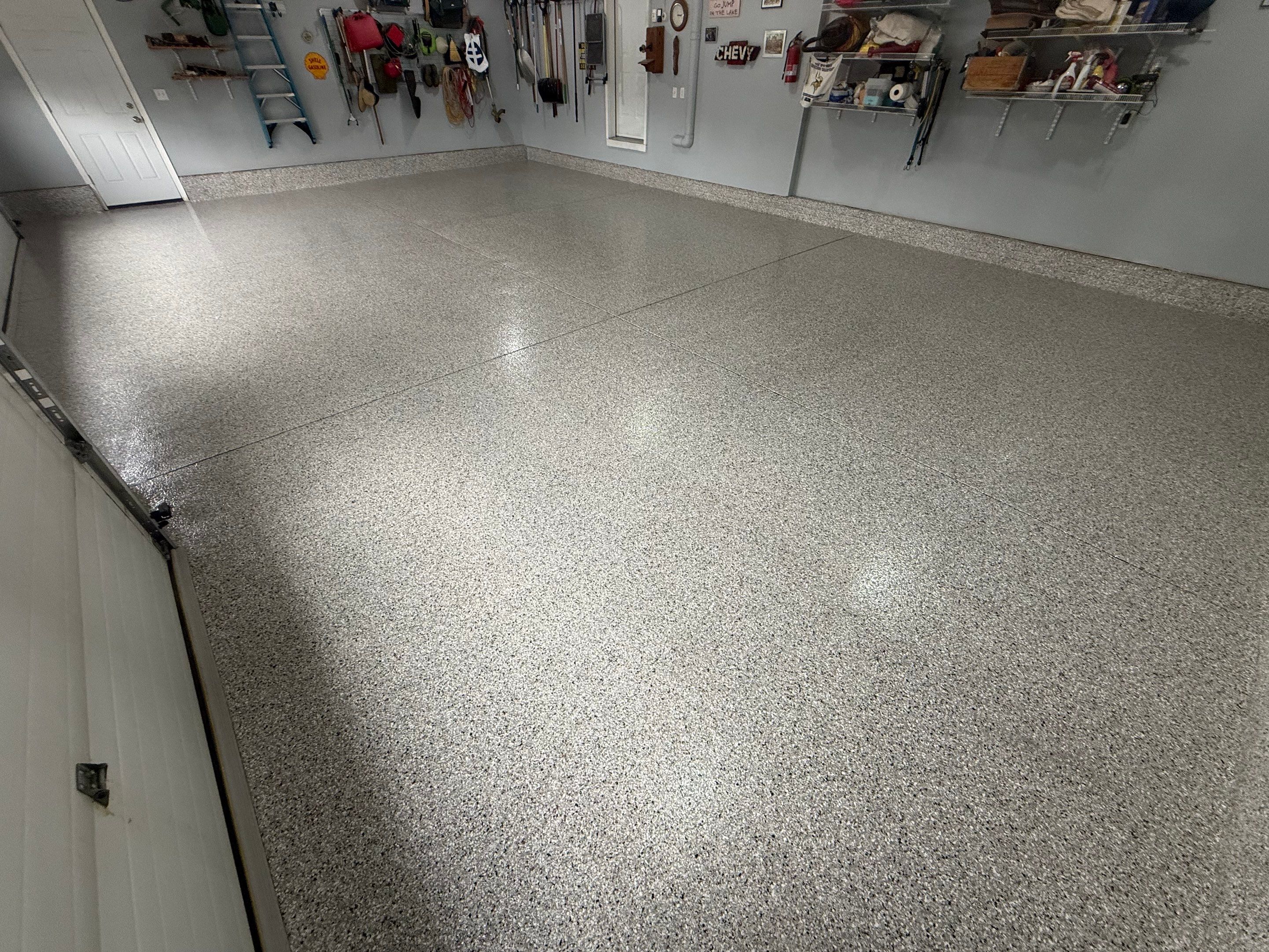 High-Gloss Epoxy Garage Floor Coating in Sioux Falls by Select Painting, Coatings & Garage Cabinets