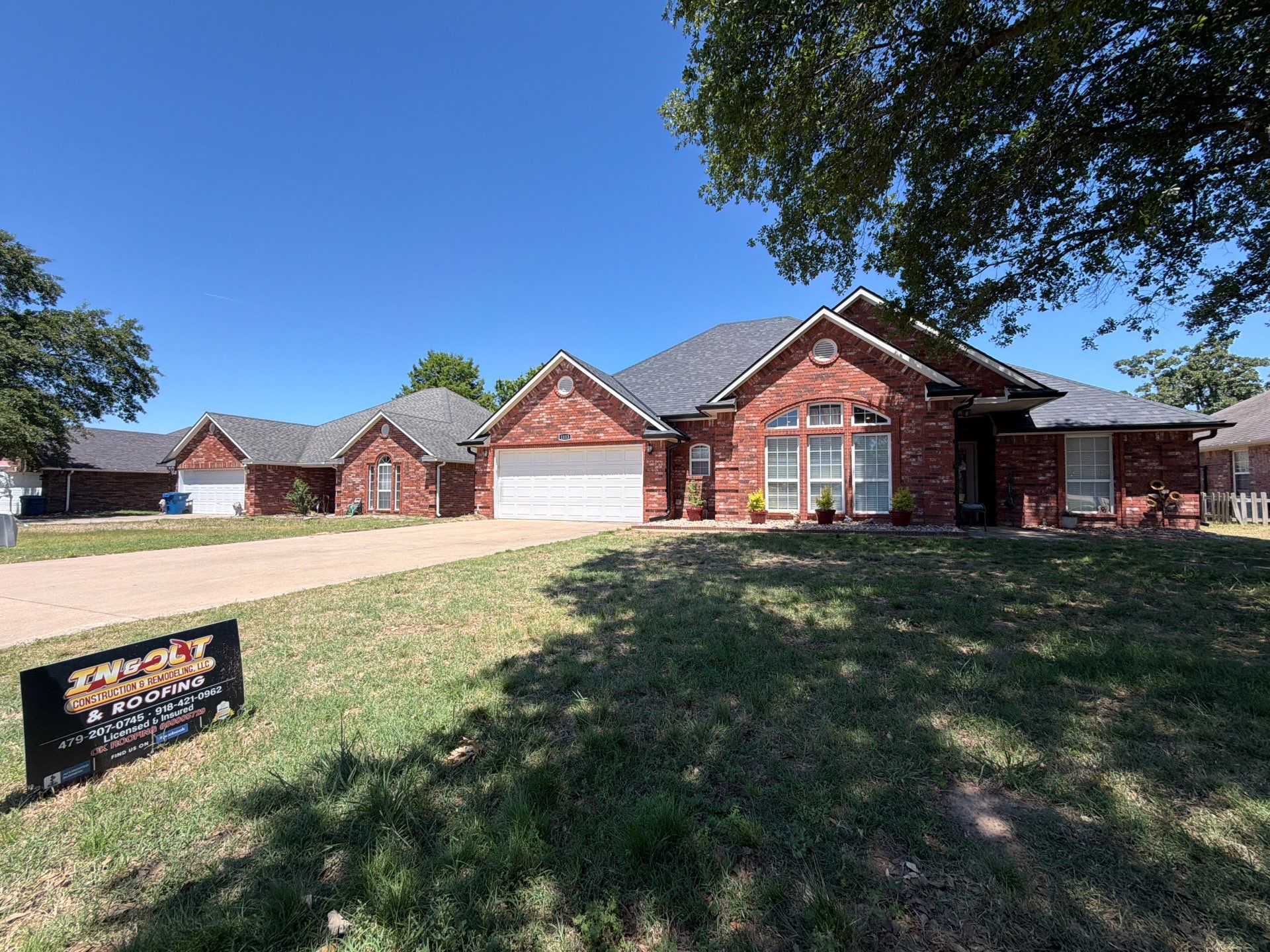 Black roof & gutters!! by In & Out Construction & Remodeling, LLC