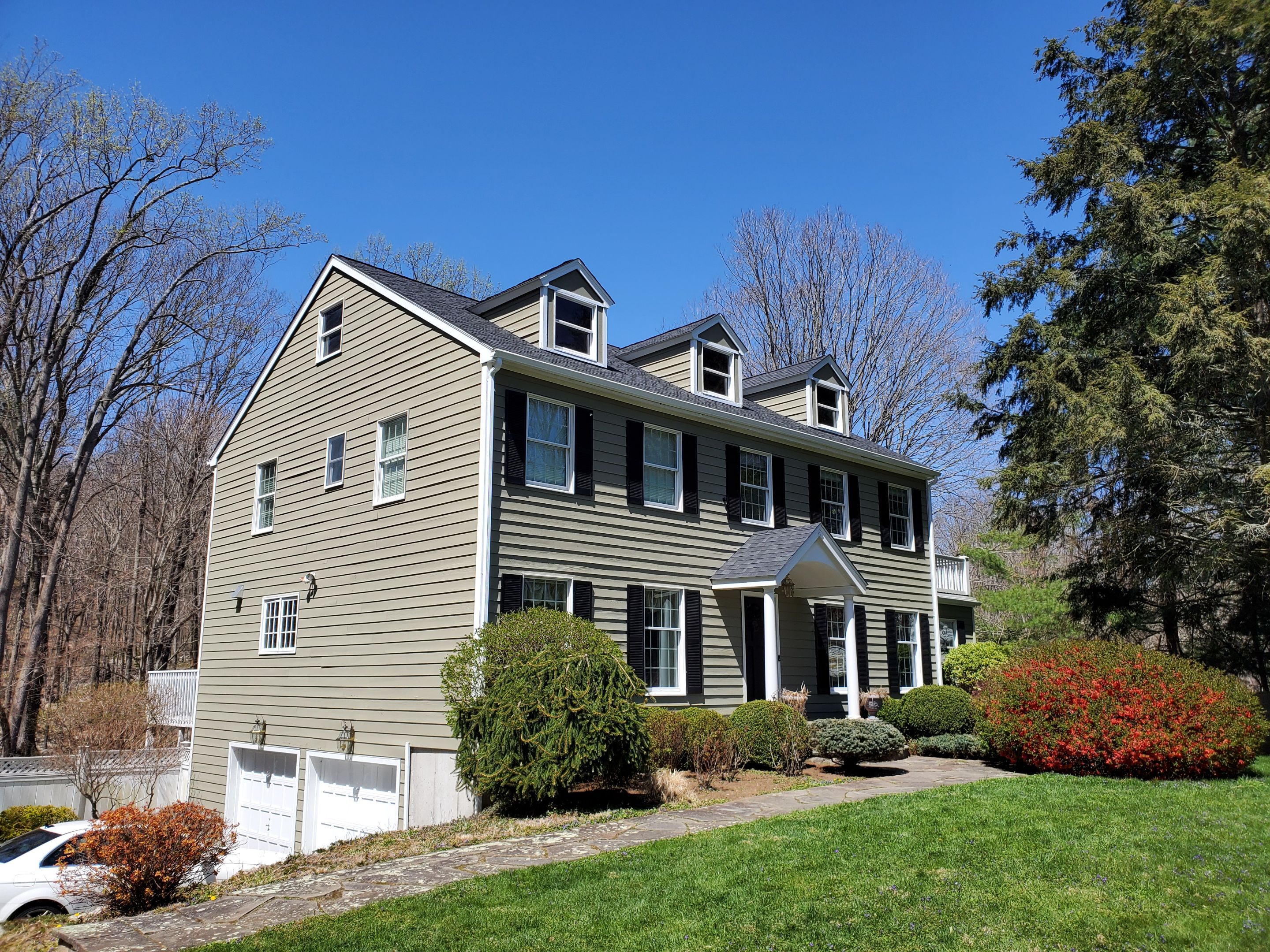Residential Roofing Installation using onyx black by A Plus Exterior