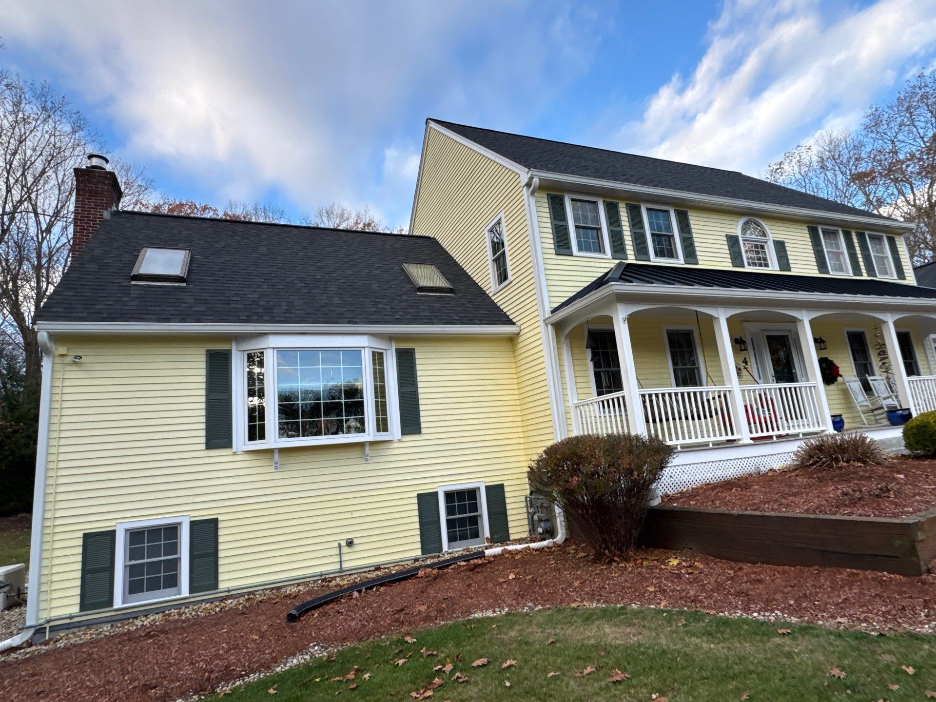 Chelmsford Premium Roof: Onyx Black Shingles with Standing Seam Metal Porch by Mighty Dog Roofing of Greater Middlesex County
