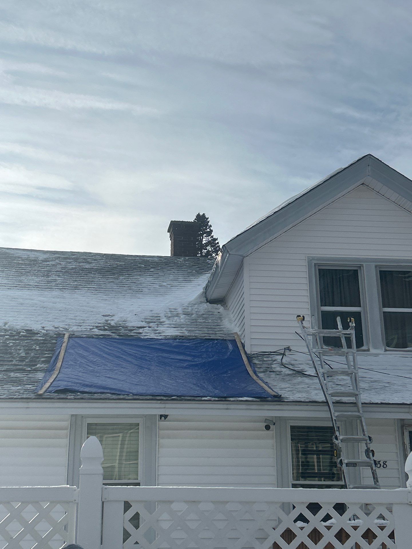 Emergency Snow Removal & Roof Tarp Installation in Lawrence, MA by Mighty Dog Roofing of Greater Middlesex County