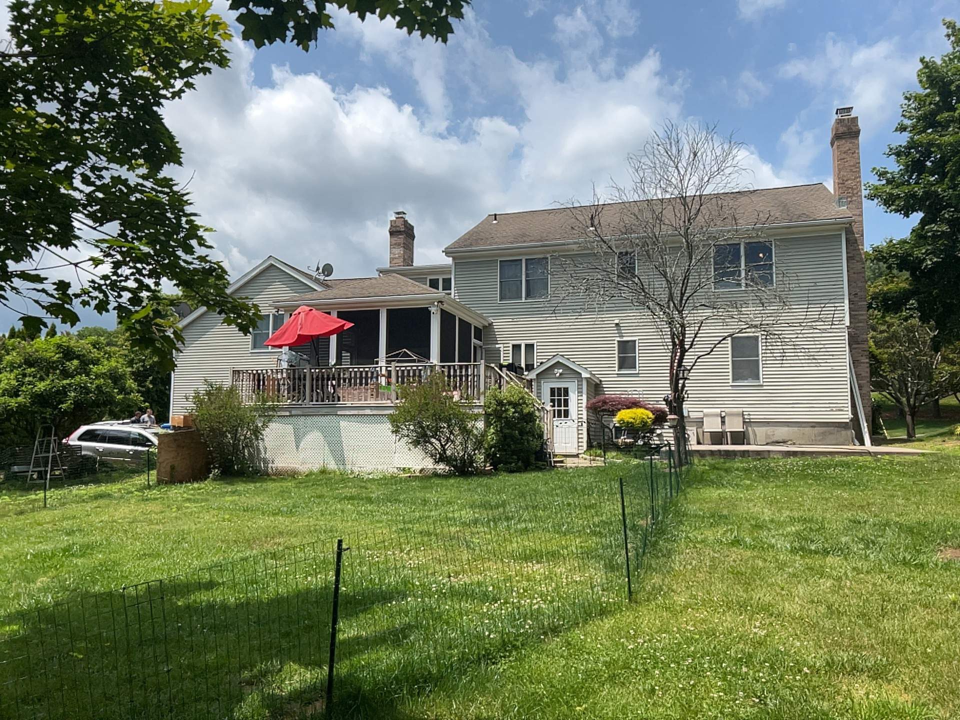 Siding Installation using Mainstreet Colonial & White gutters by A Plus Exterior