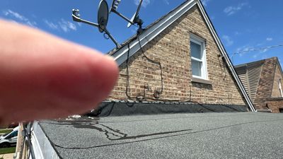 Turtle Shell gutter protection installation in Chicago, IL 60634, photograph 13