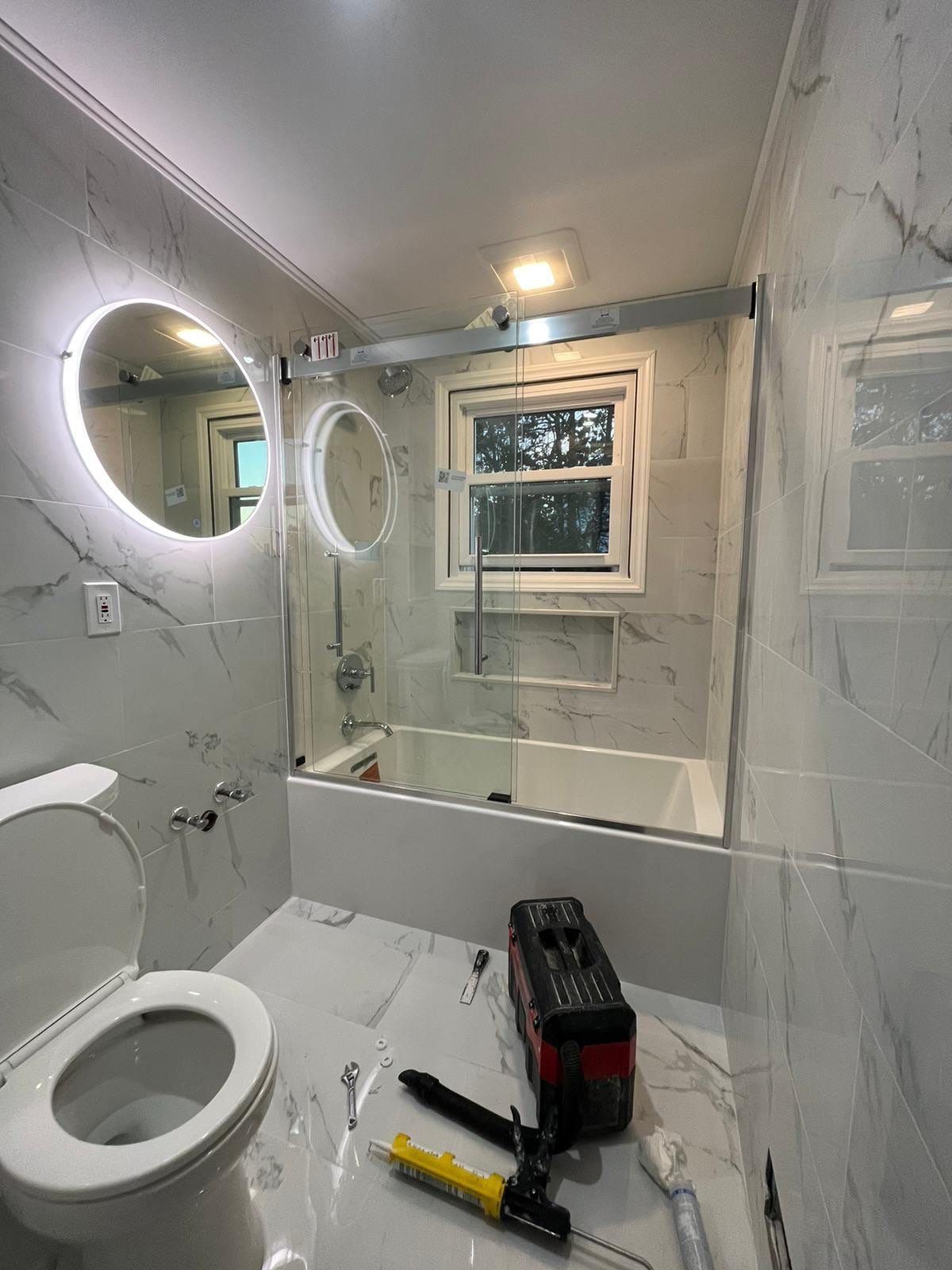 Bathroom Remodel using Tile by Home Concepts Construction