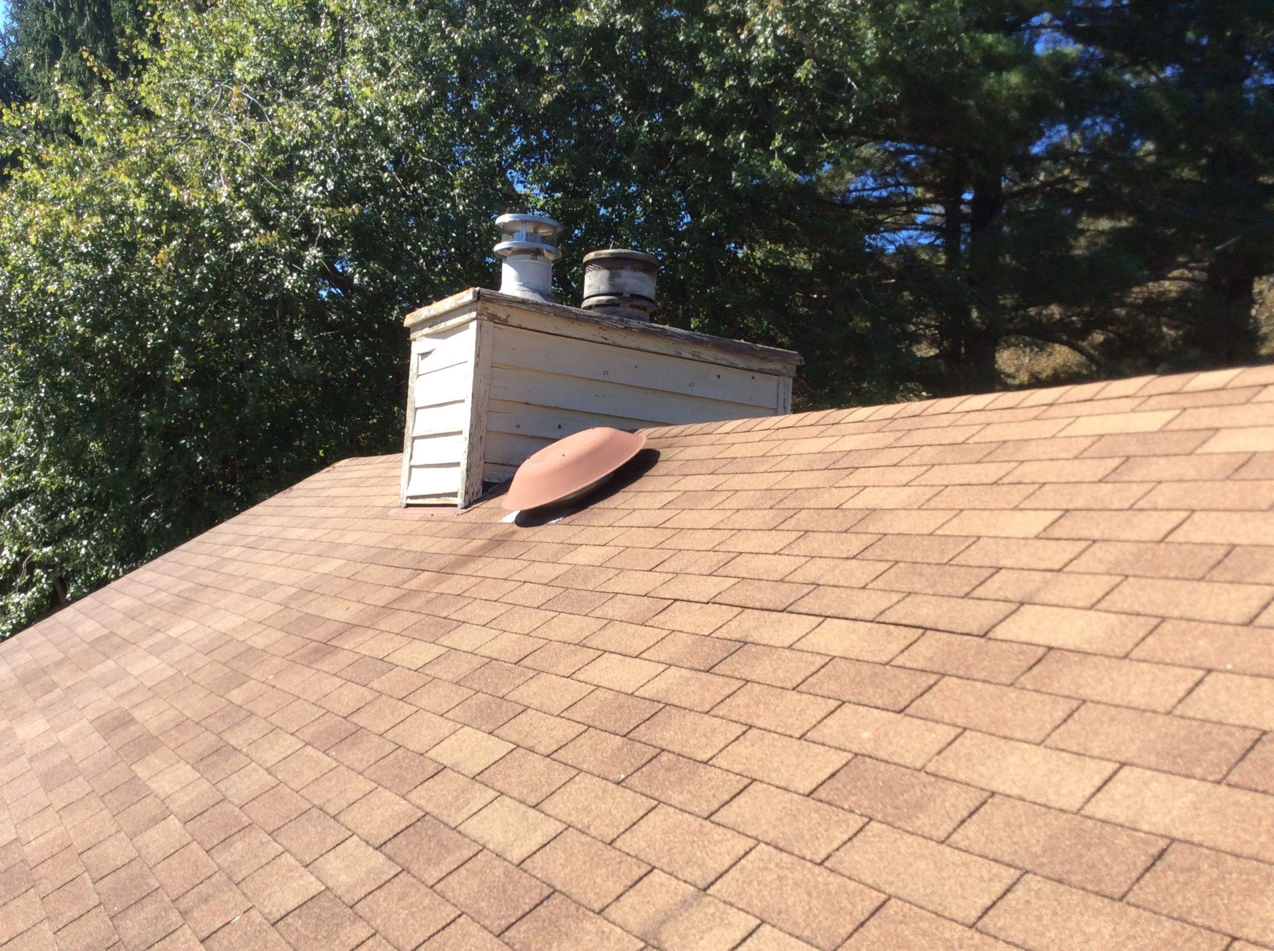 Residential Roofing Installation using Pewterwood Shingles  by Alpha Design Services