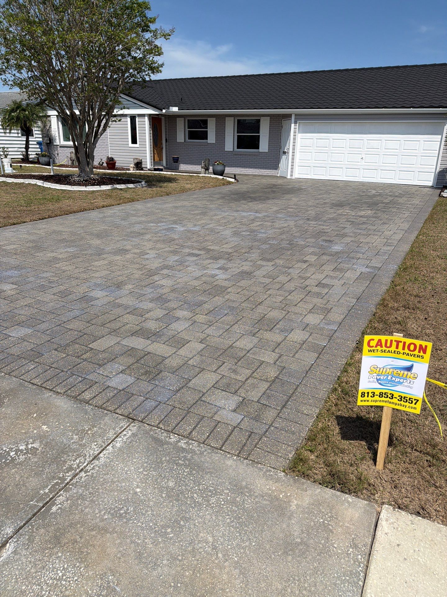 Paver Sealing and Restoration for Sun City Center Driveway by Supreme Paver Experts