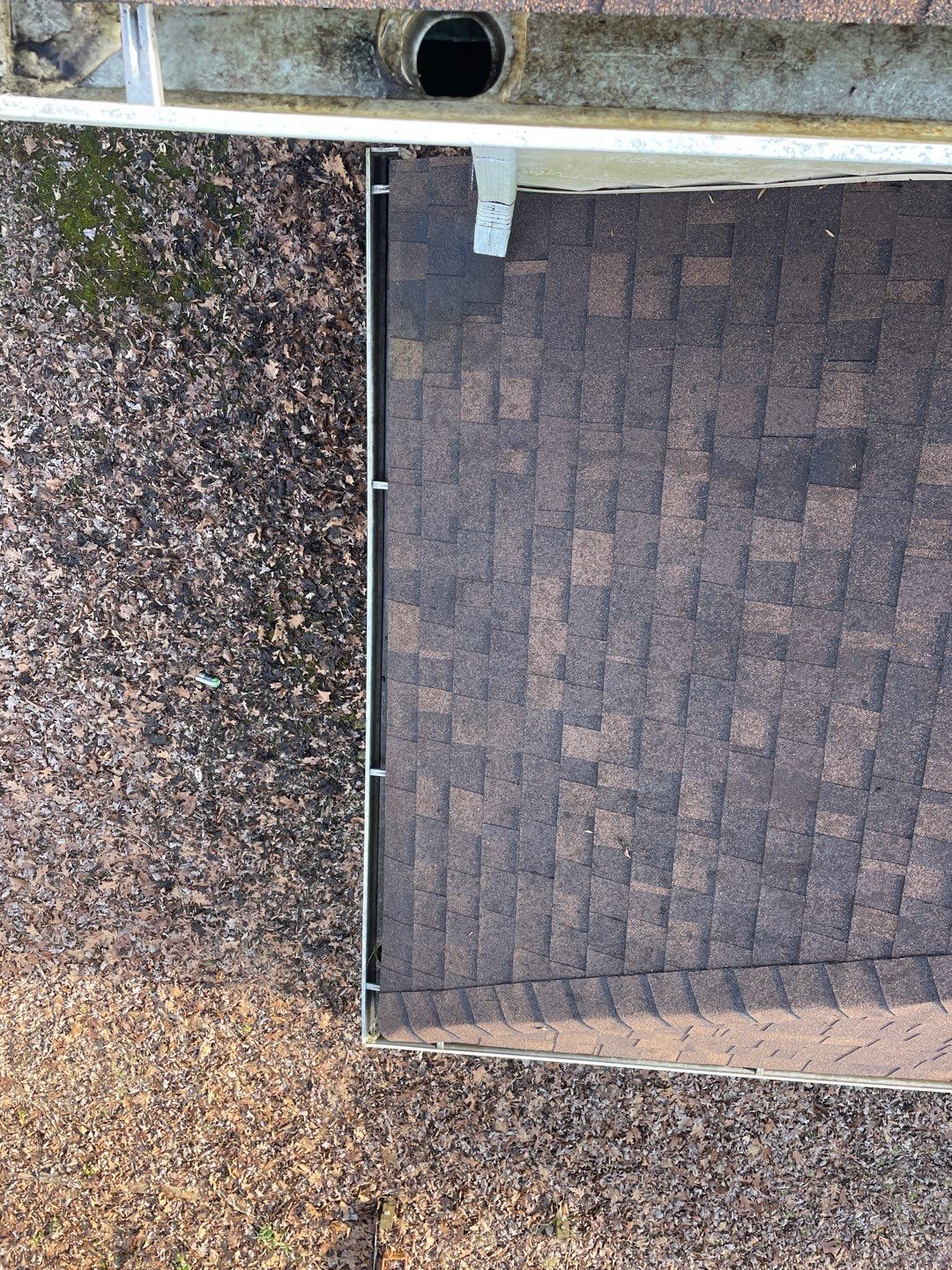 Cleaning Gutters  by Deerfield Roofing LLC