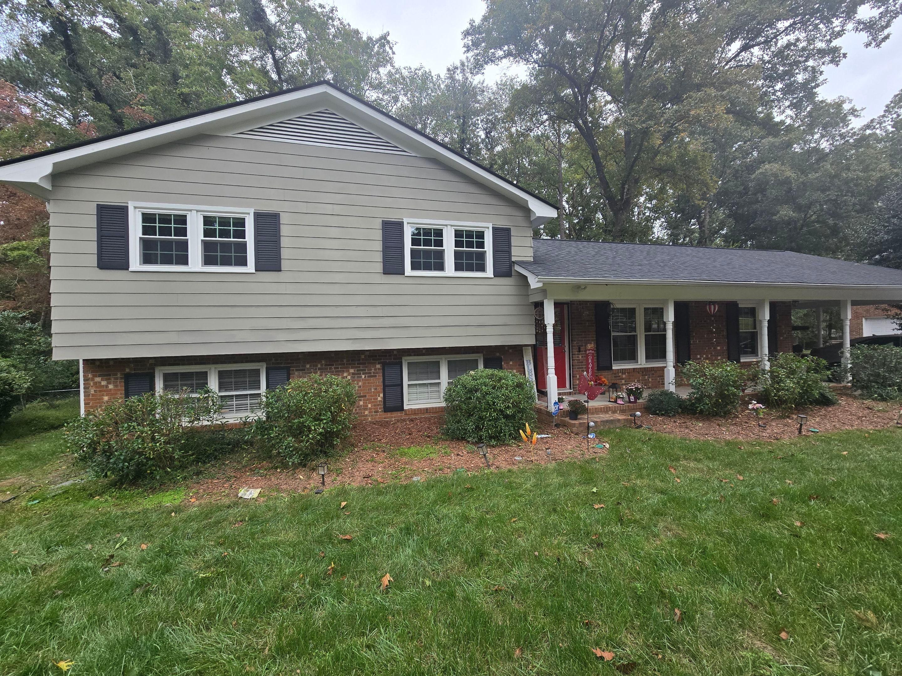 Durham Residential Siding and Window Replacement with Horizontal Lap Siding by The Remodeling Company