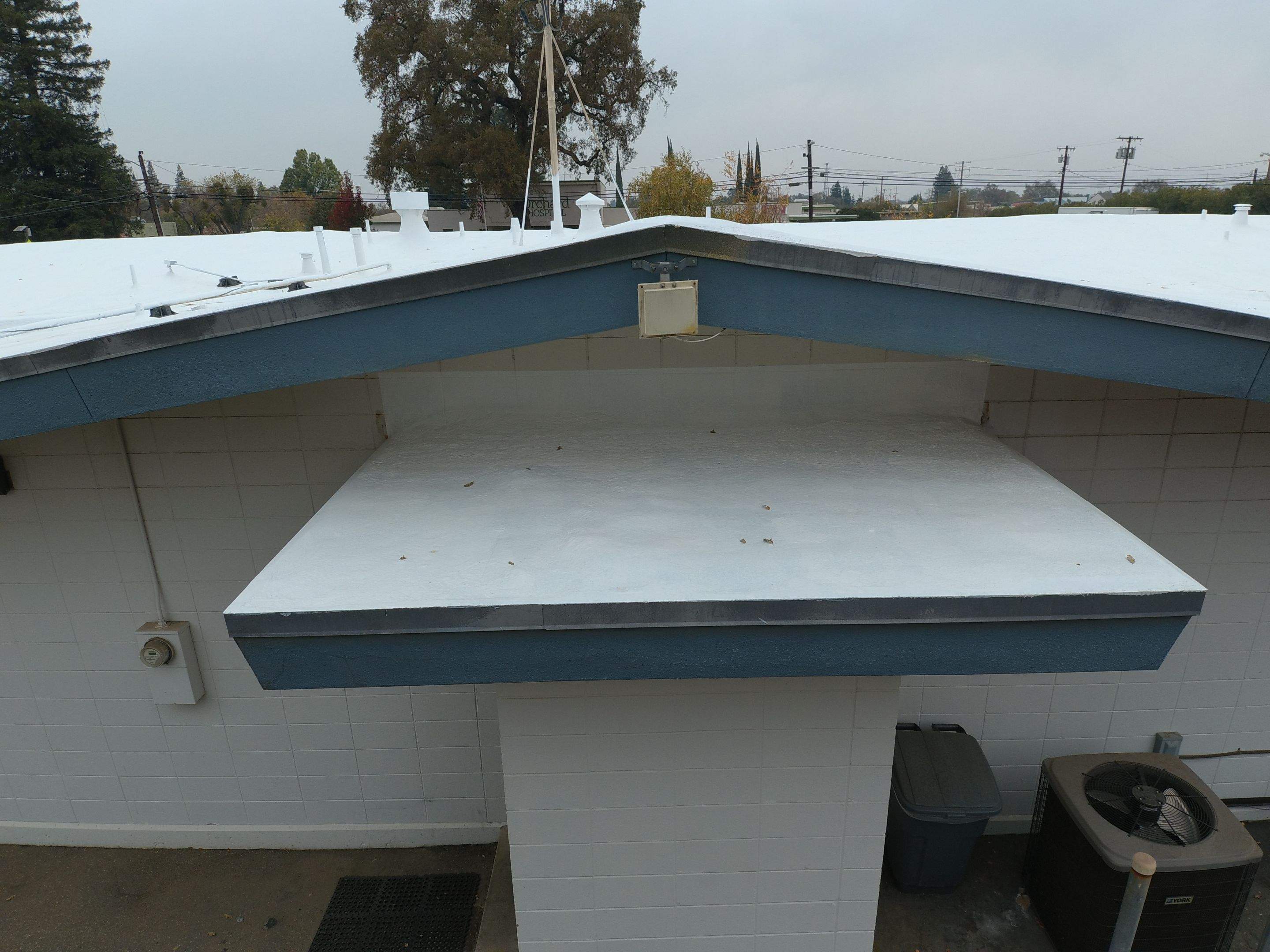 Spray foam and coatings using Conklin Benchmark/PUMA XL coatings and spray foam by Straight Edge Roofing Inc