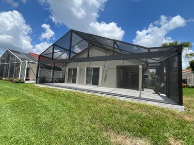 Porcelain Paver Patio and Screen Enclosure Installation in Boynton Beach