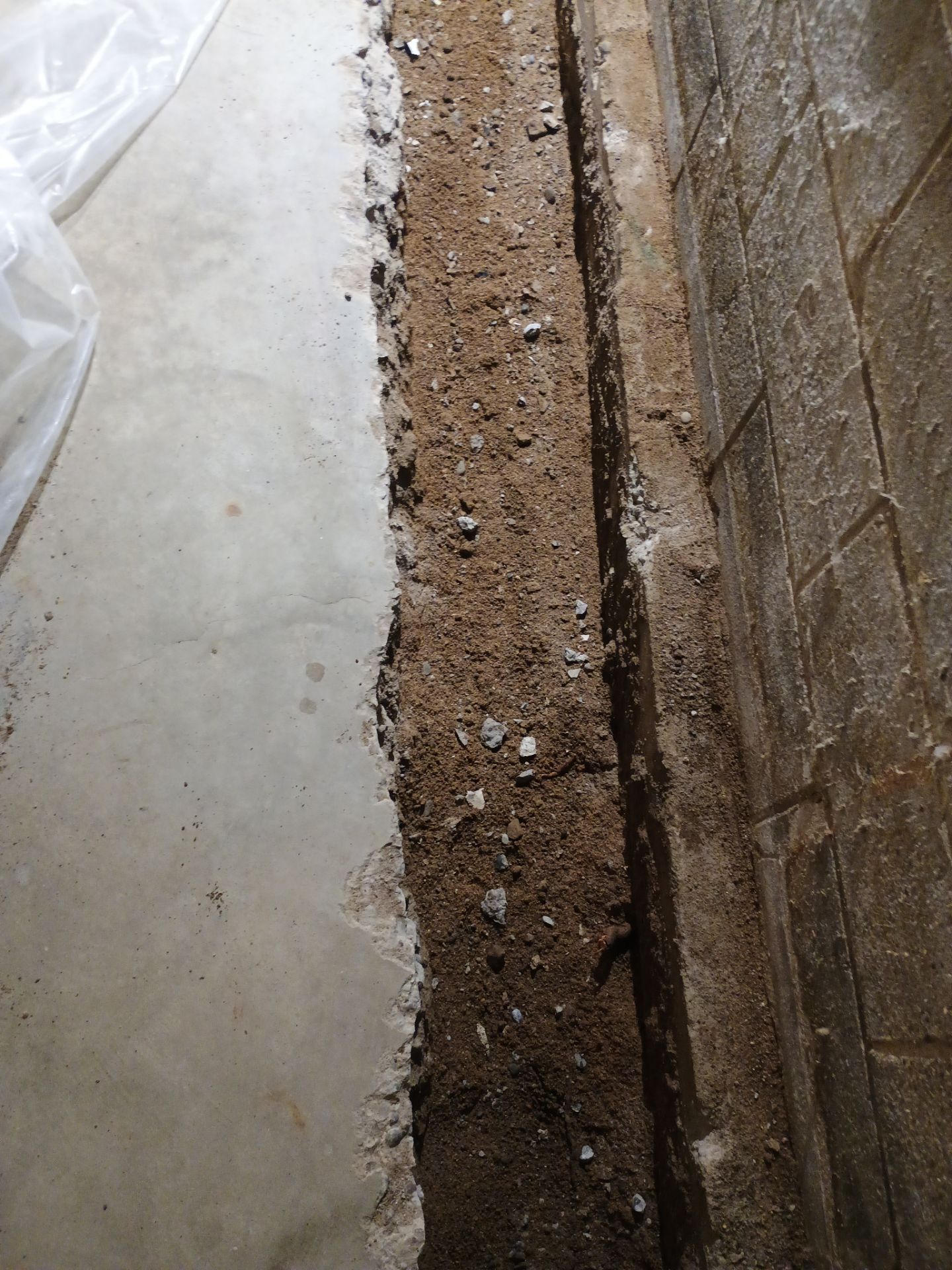 Interior Drain Tile Installation near Columbia Heights, MN by Waterproofing Northeast