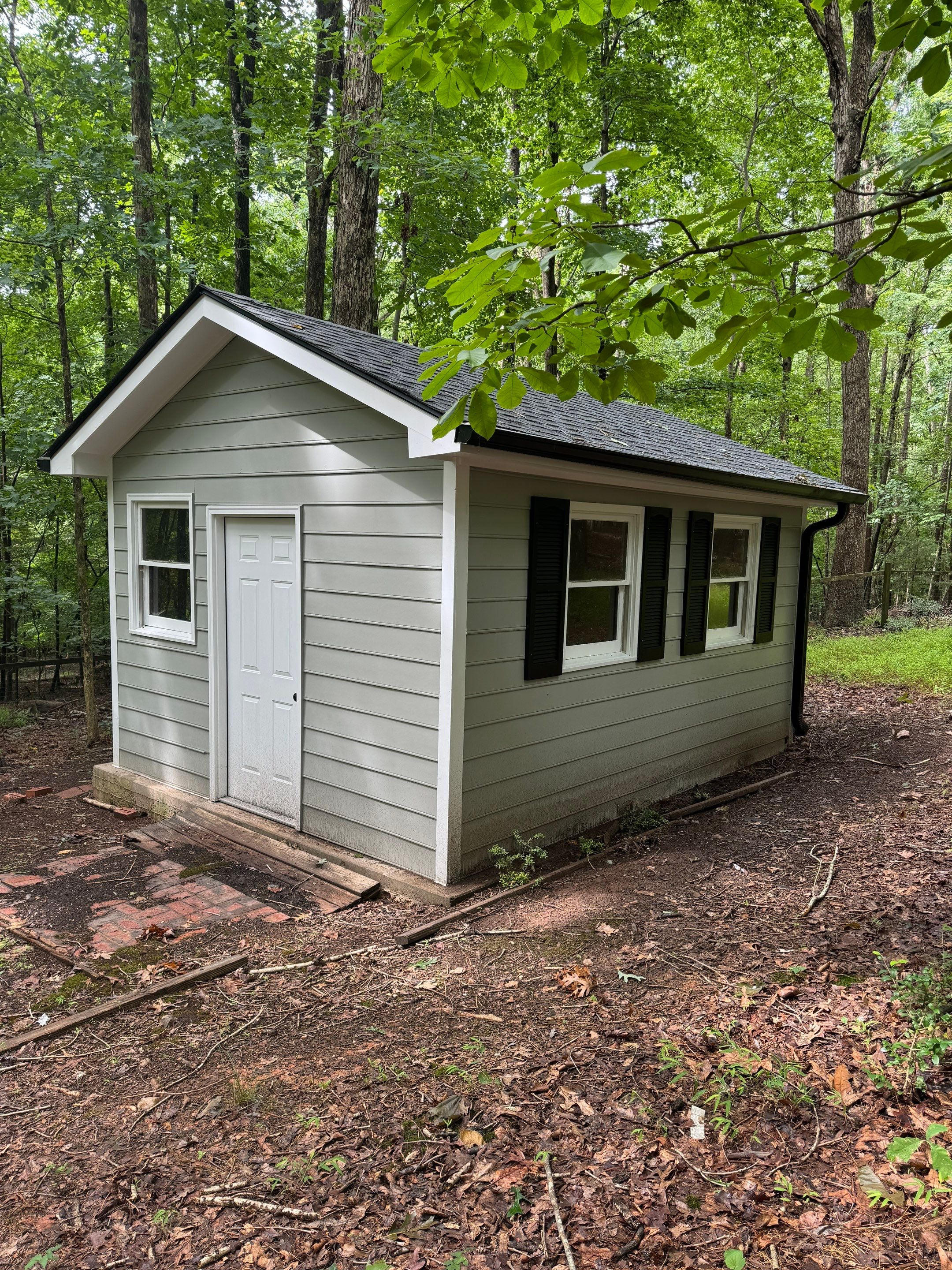 GAF Timberline HDZ Pewter Gray - 5” Black Gutters  by Pro Performance Roofing