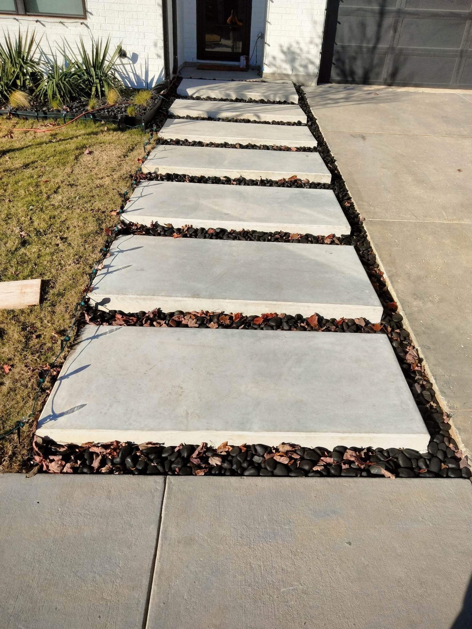 Concrete & Outdoor Living by Trophy Roofing & Construction LLC