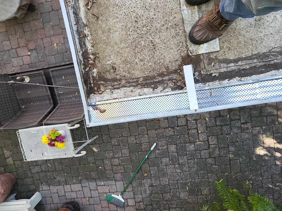 Seamless Gutter Installation using K-Style Seamless Gutters and LeafBlaster Pro Gutter Guards by Gutter Professors