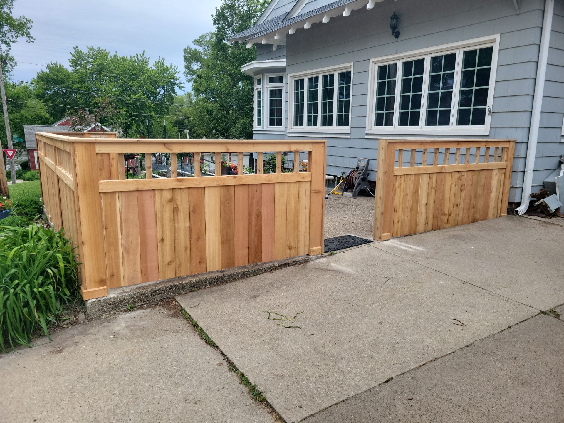 Custom Cedar Patio Fence in Waterloo by Perfect Picket Fence and Stain