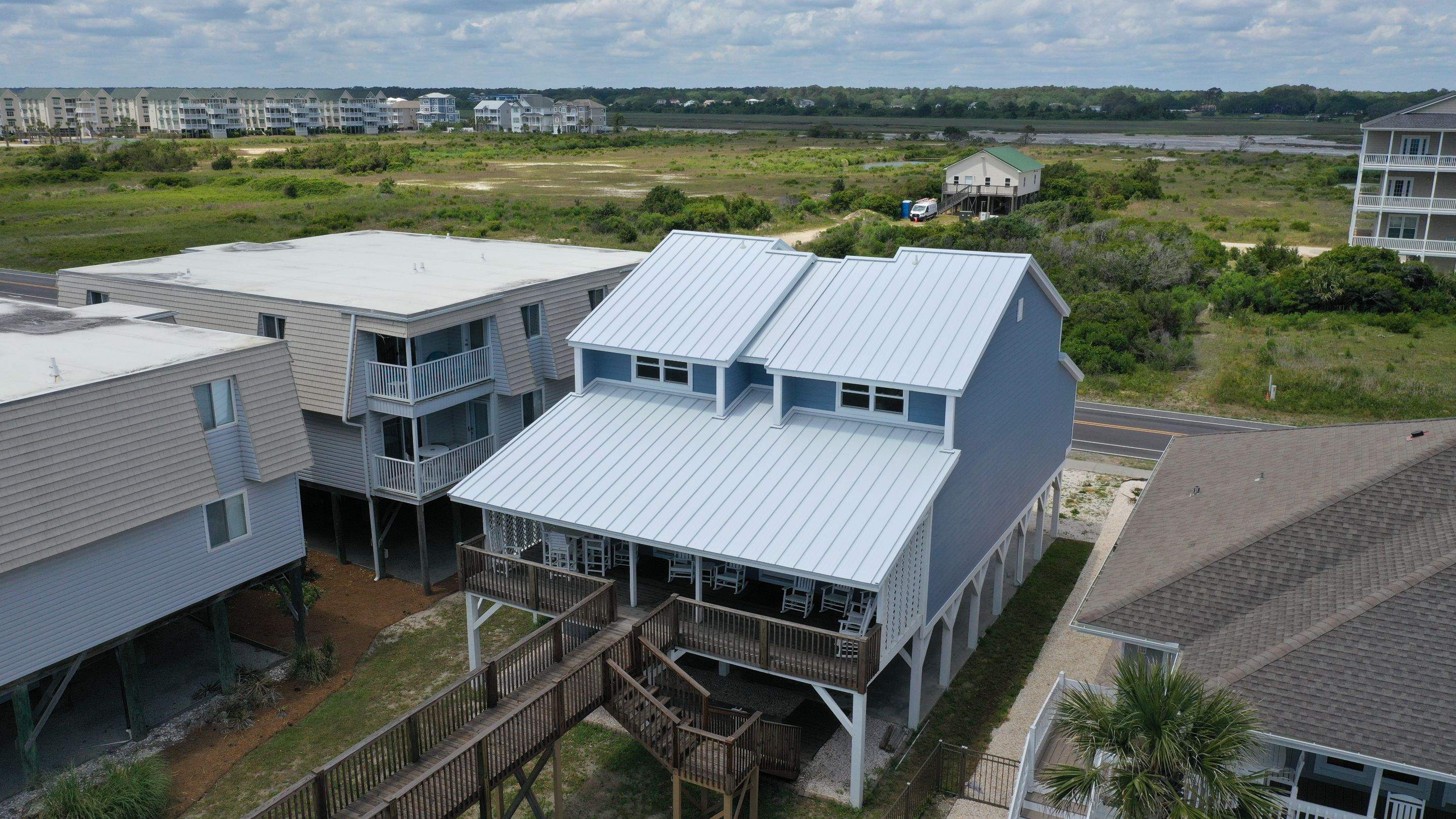 Standing Seam Aluminum- Regal White  by Linta Roofing Inc