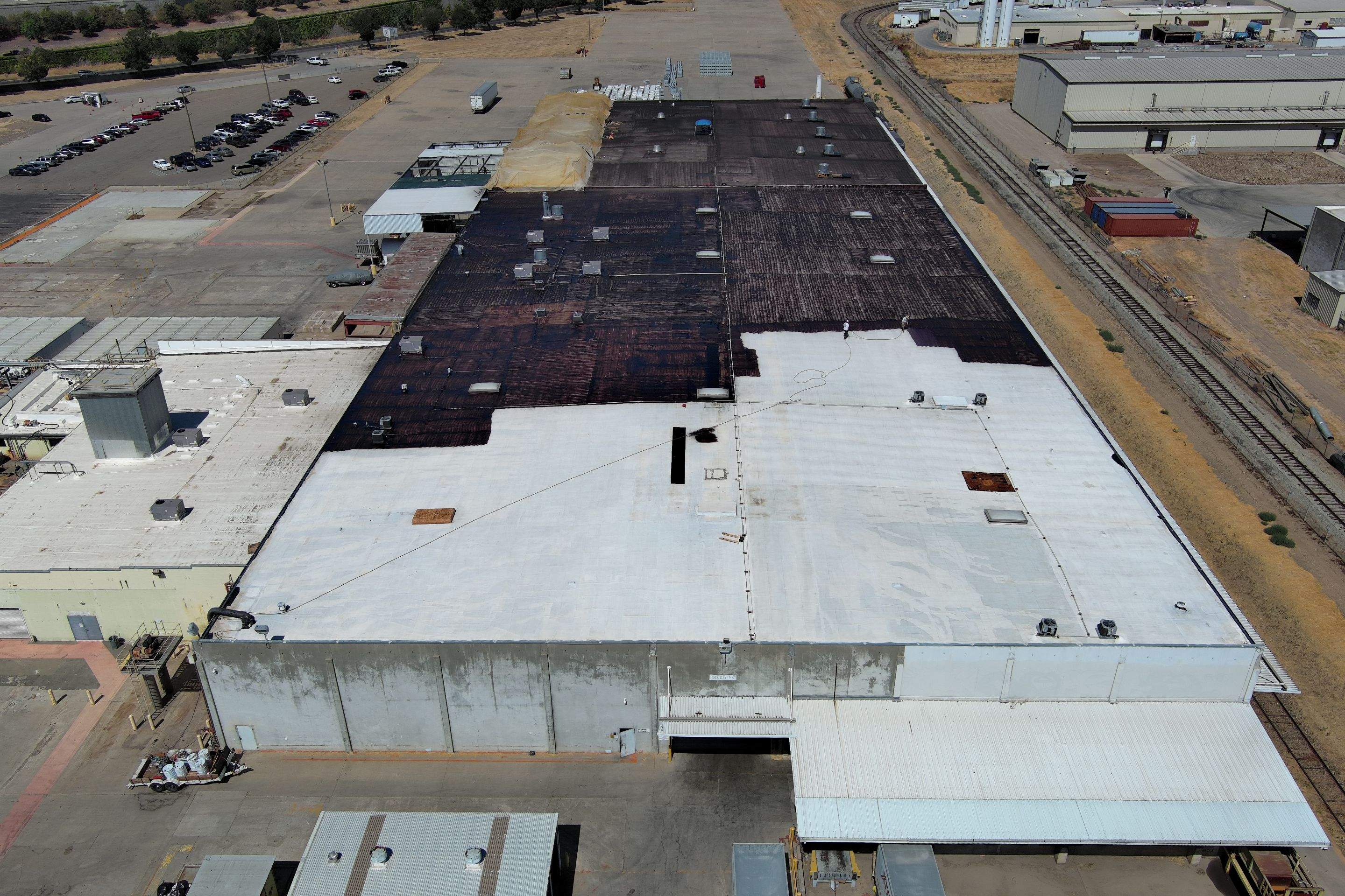 Pro Farms Spray foam roofing project by Straight Edge Roofing Inc