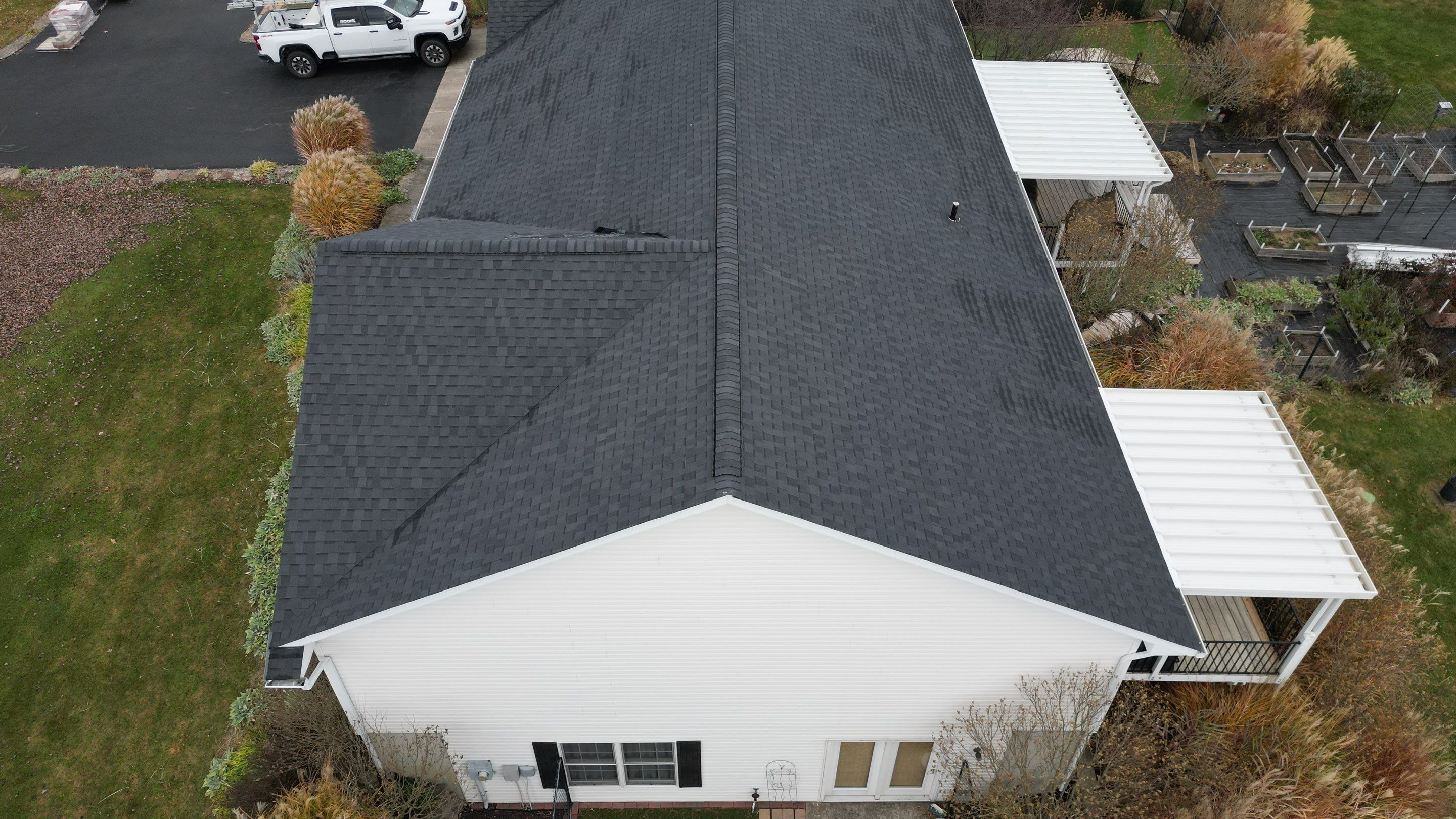 Residential Roofing Installation using Performance Panel Metal - Frost Black by RoofX 