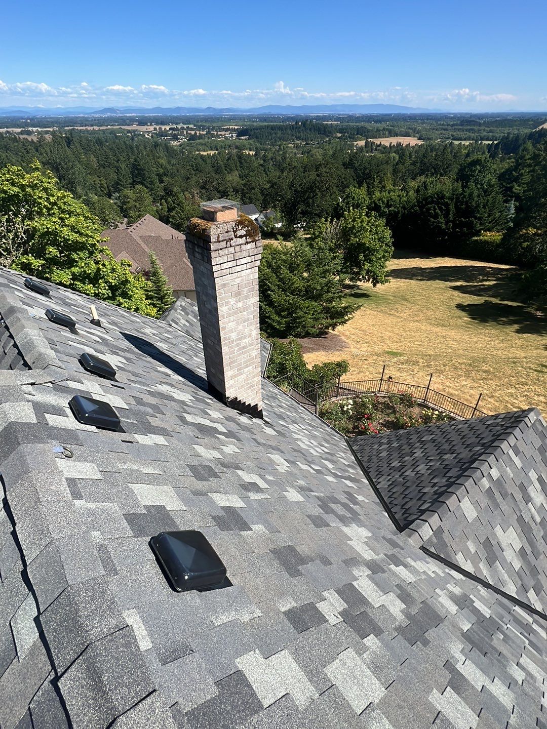 Residential Roofing Installation using Malarkey Windsor 50 Year Shingle (Color: Storm Grey) by Orezona Building & Roofing Company, Inc.