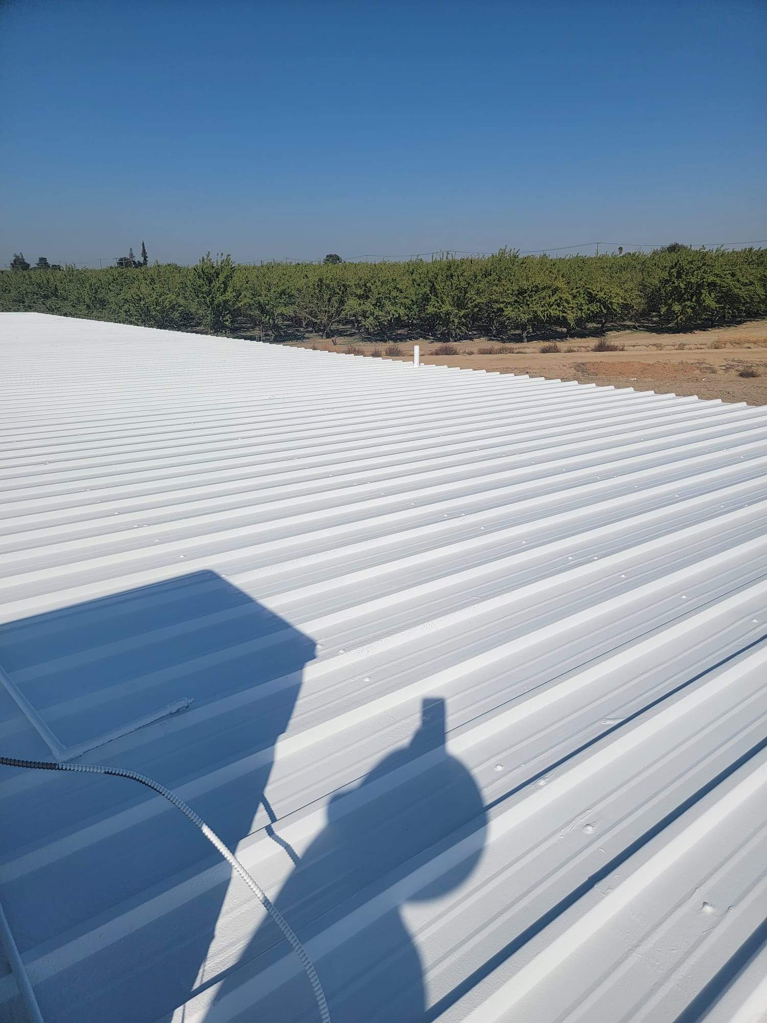 MR Roofing system using Conklin Benchmark/PUMA XL fabric and coating by Straight Edge Roofing Inc
