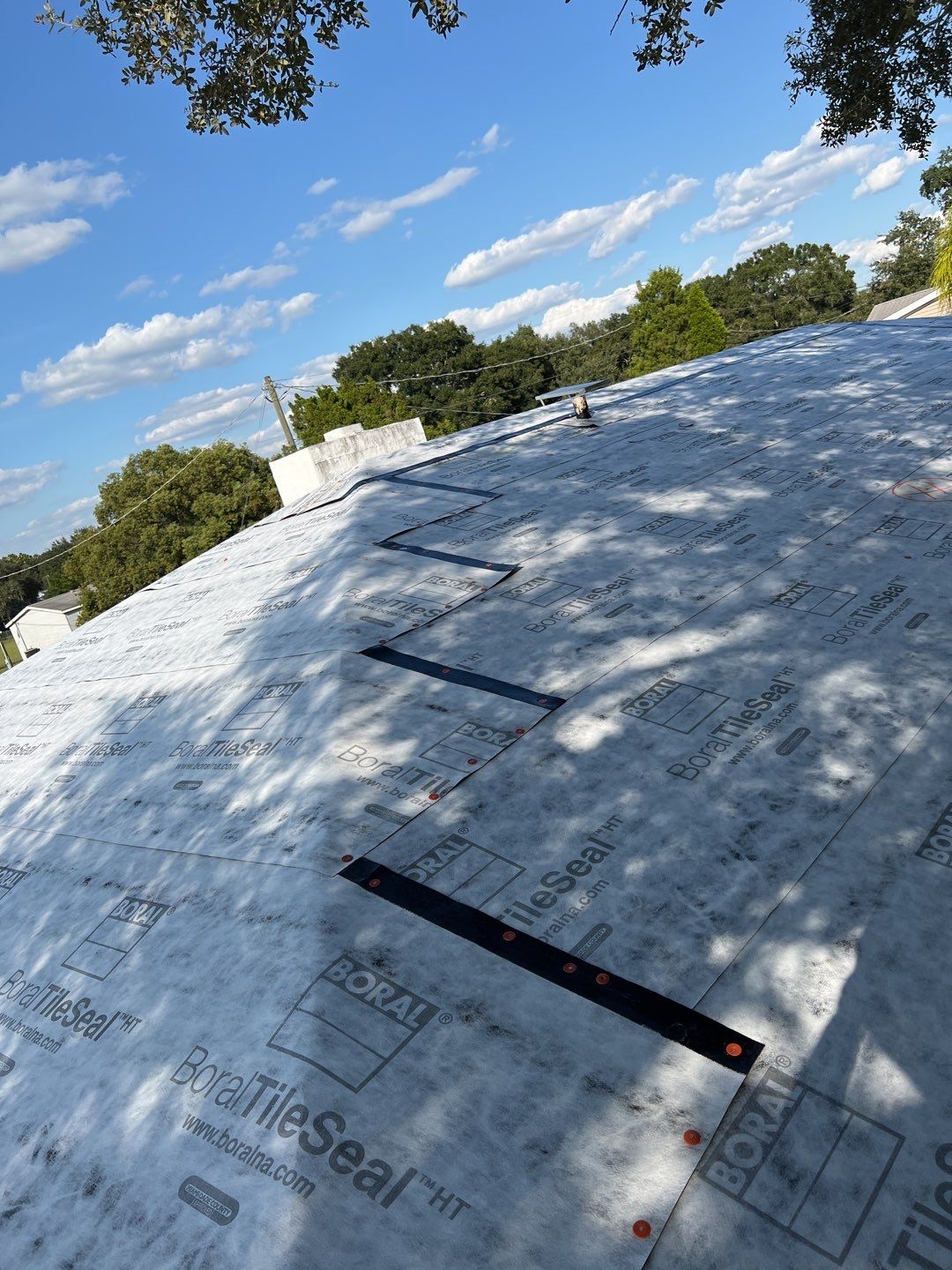 Residential Roofing Installation using 26 GA Rib Panel Galvalume by 1st Class Roofing, Inc.