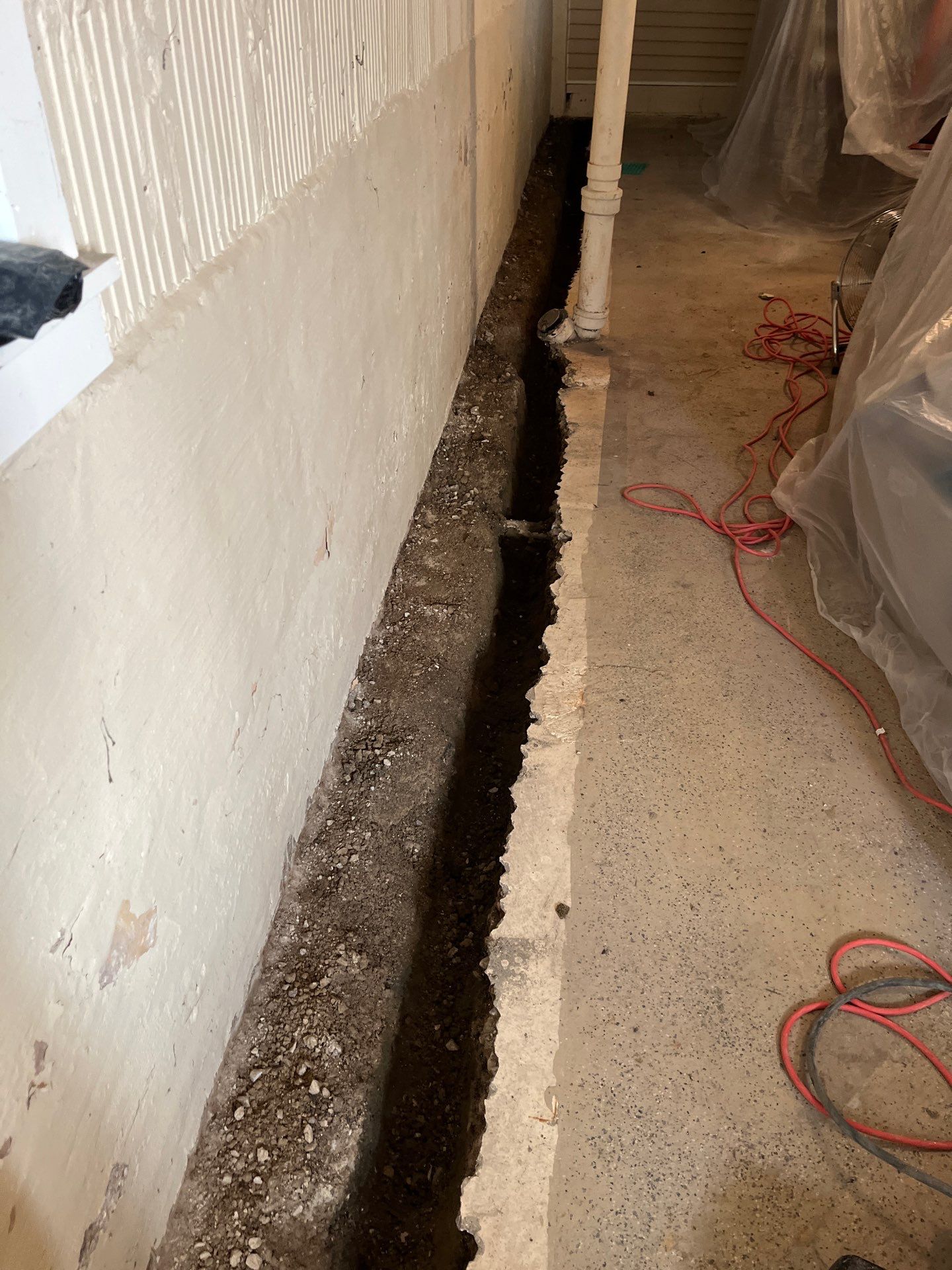 Berwyn- Interior Drain Tile System by Area Wide Waterproofing