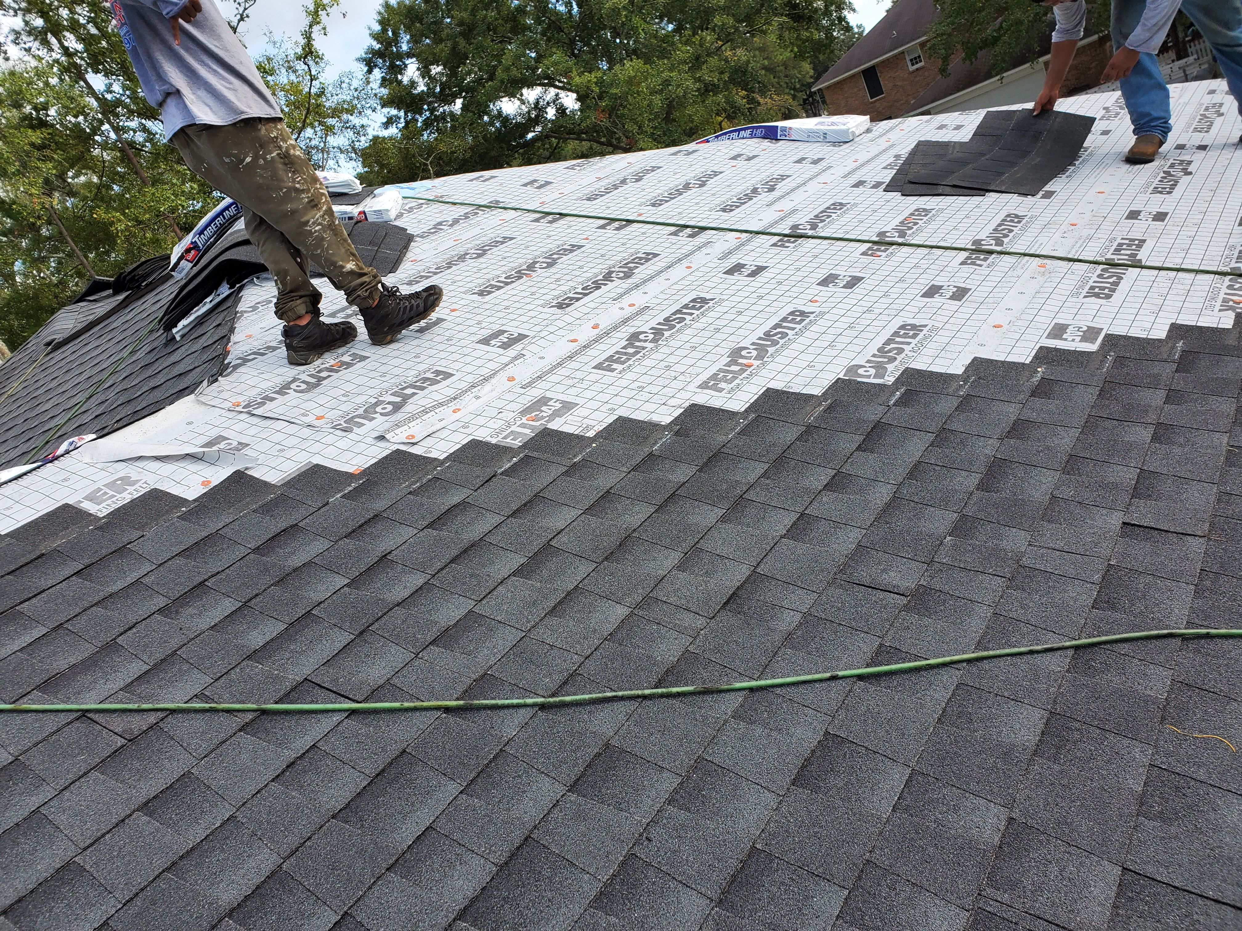 Residential Roofing Installation using Roof Replacement by American Roofing & Construction LLC