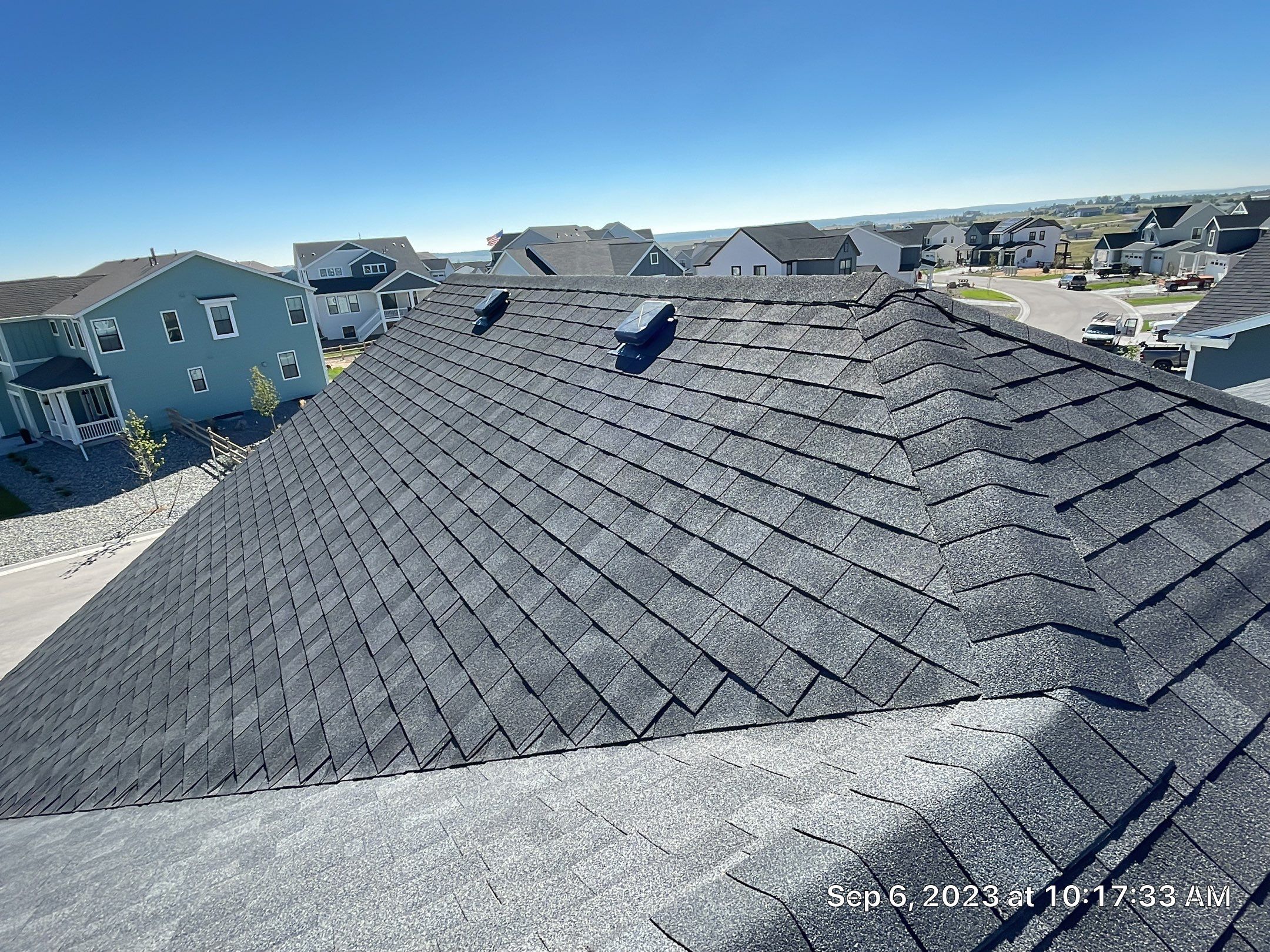 Residential Roofing Installation using Atlas Pinnacle Impact Black Shadow by Blue Peaks Roofing LLC 