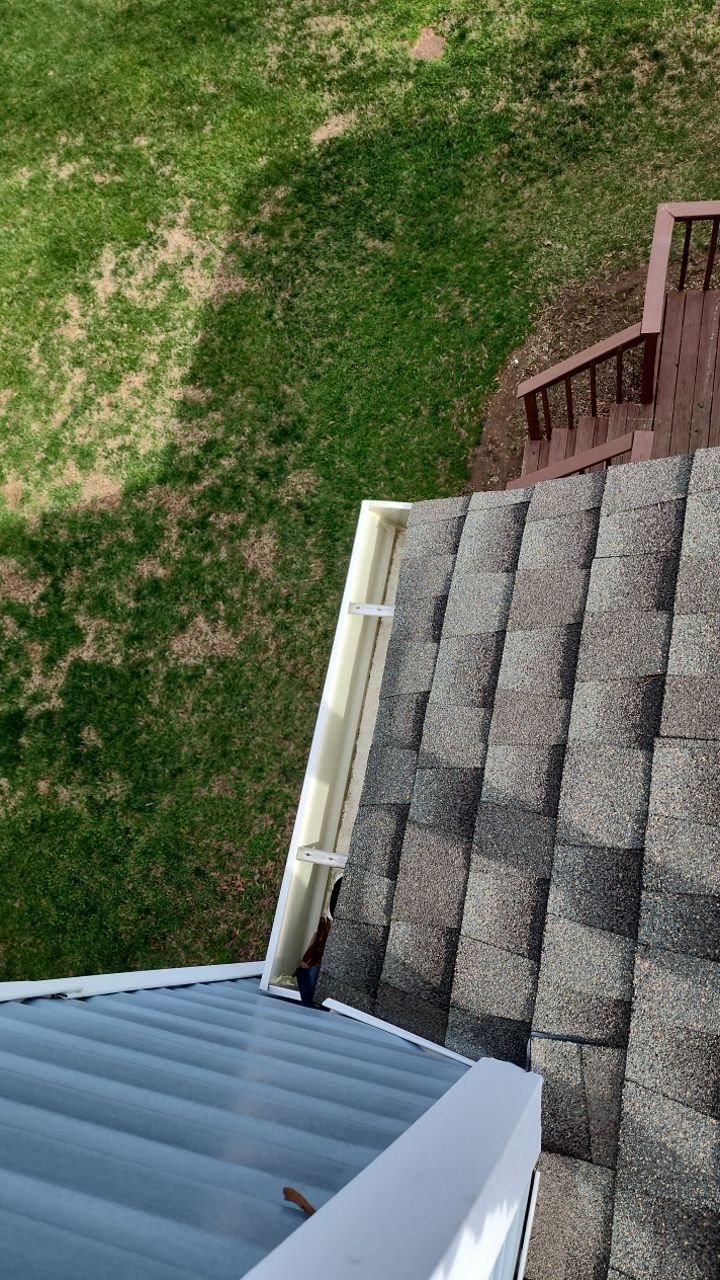 Gutter Cleaning using water by Power Wash Masters LLC