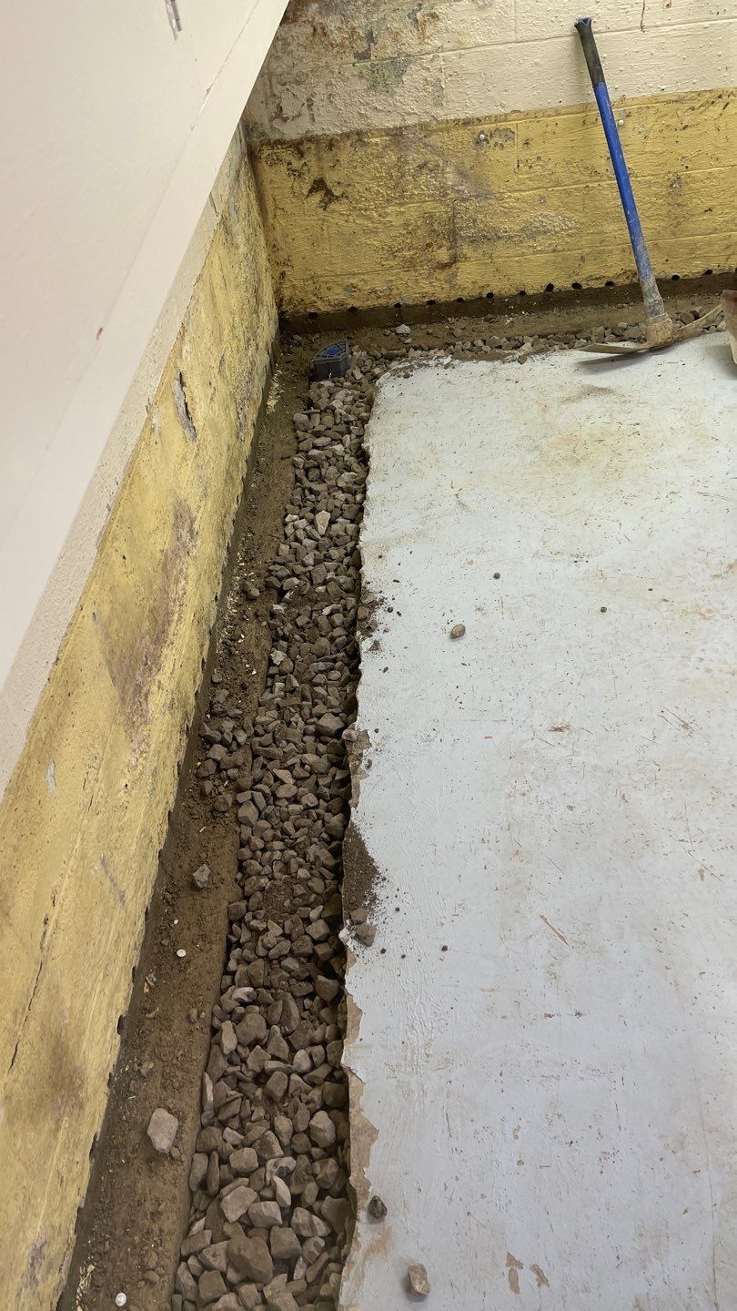Interior Waterproofing Using GrateDrain™ Products by Toledo Basement Repair 