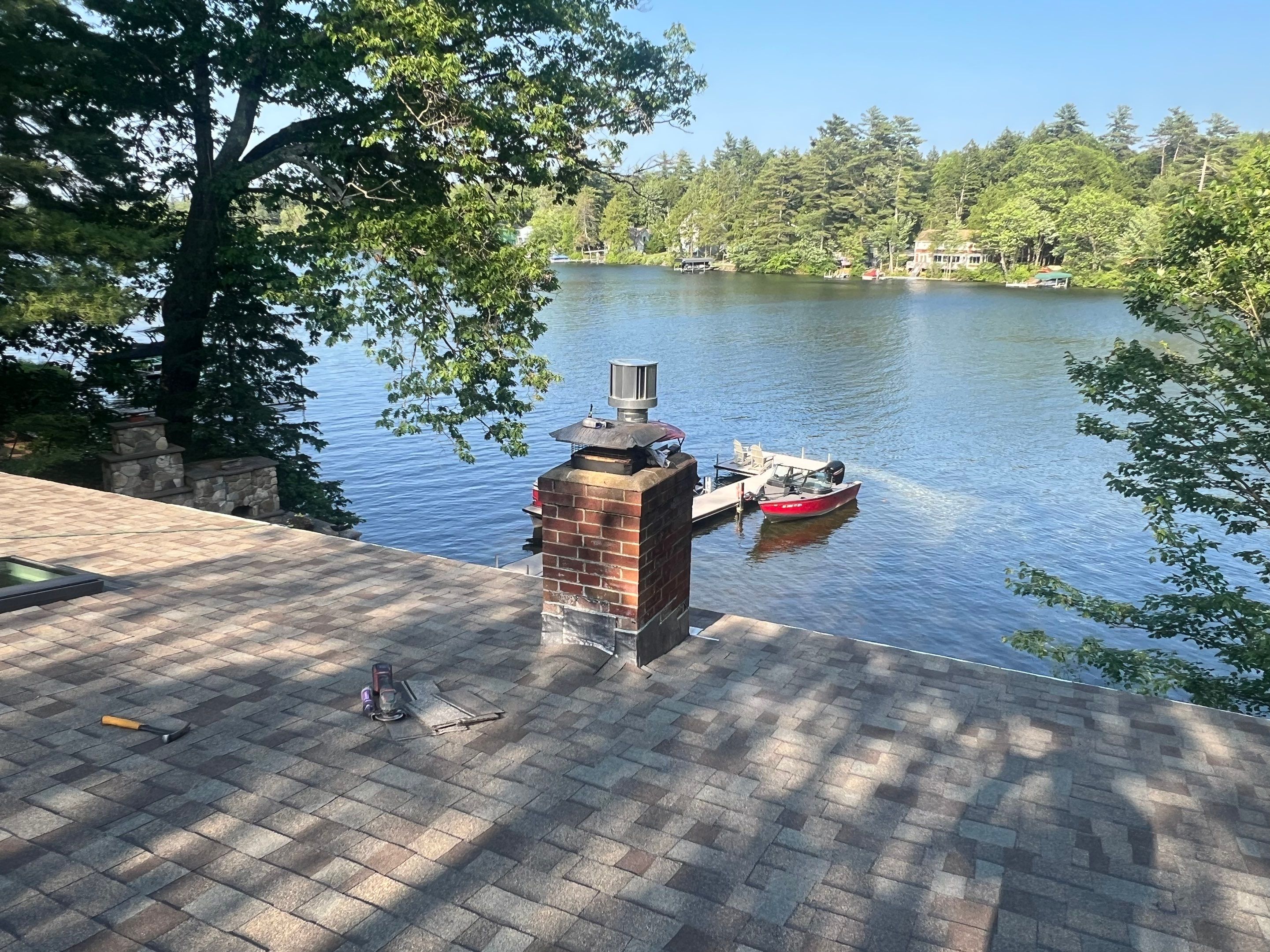 OC Roof Install On The Lake In Deerfield, New Hampshire by Tall pine roofing
