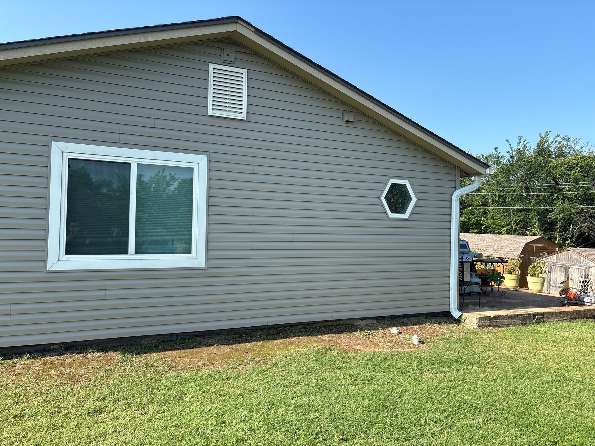 siding replacement in Guthrie by McCann's Roofing and Construction