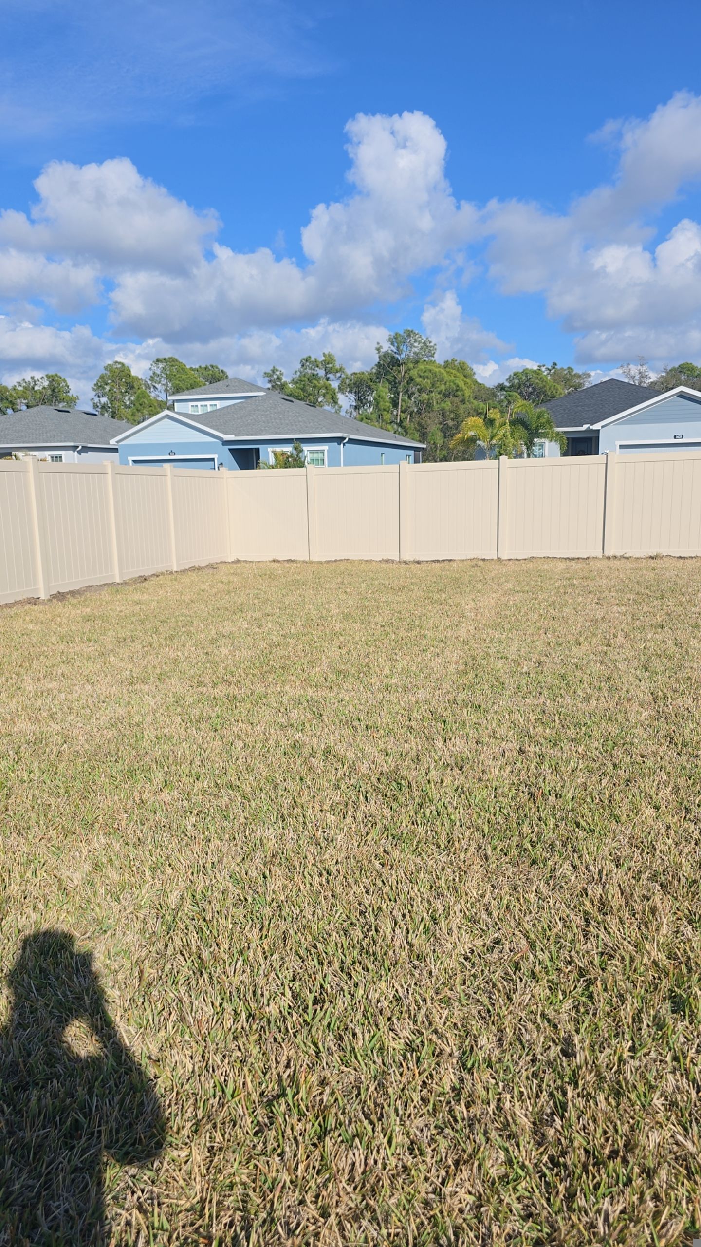 Tan Vinyl Fence in West Port by True Fence LLC