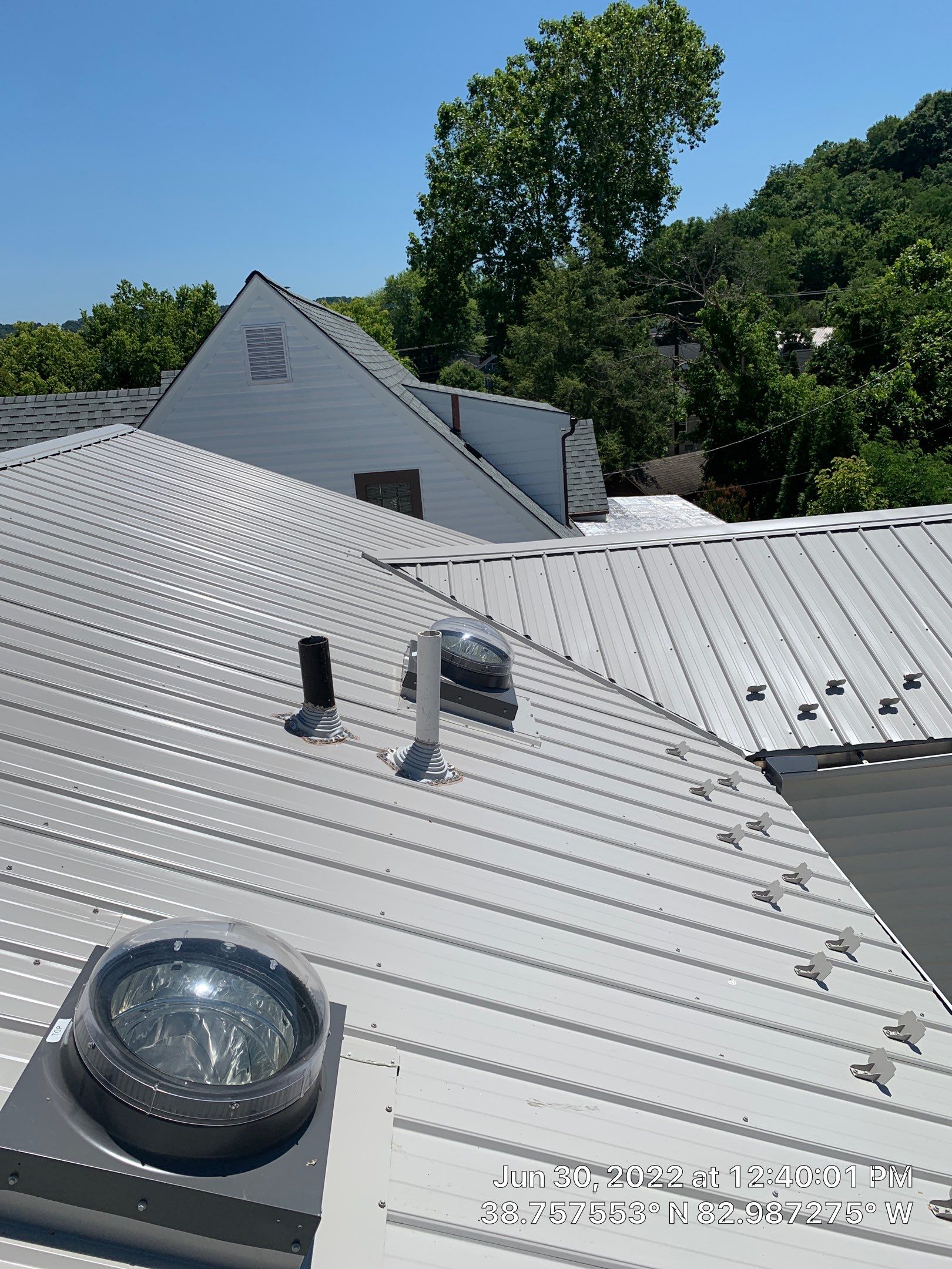 Metal Roofing, Skylights, Porch Build by Secure Construction Company Inc