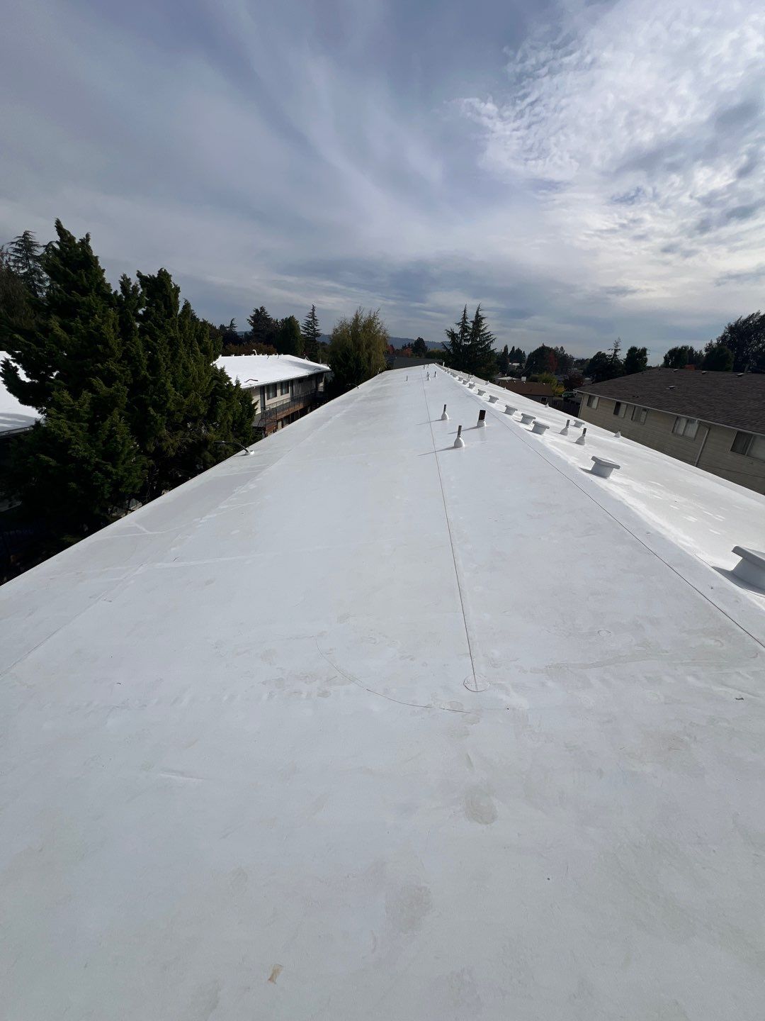 Commercial Flat Roof Installation using GAF 60Mil TPO  by Orezona Building & Roofing Company, Inc.