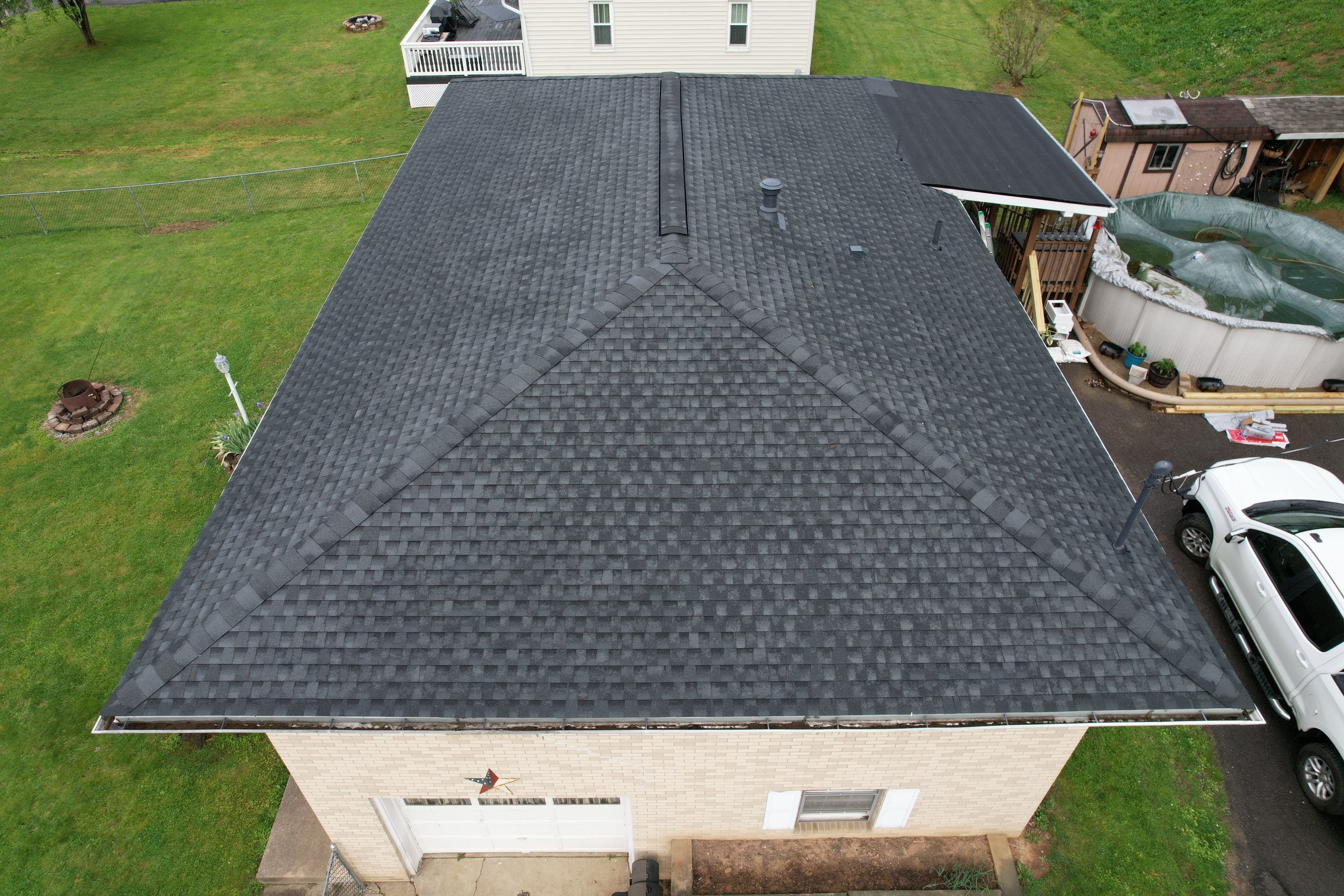 Residential Roofing Installation using GAF Timberline HDZ Charcoal by Rainstoppers Roofing