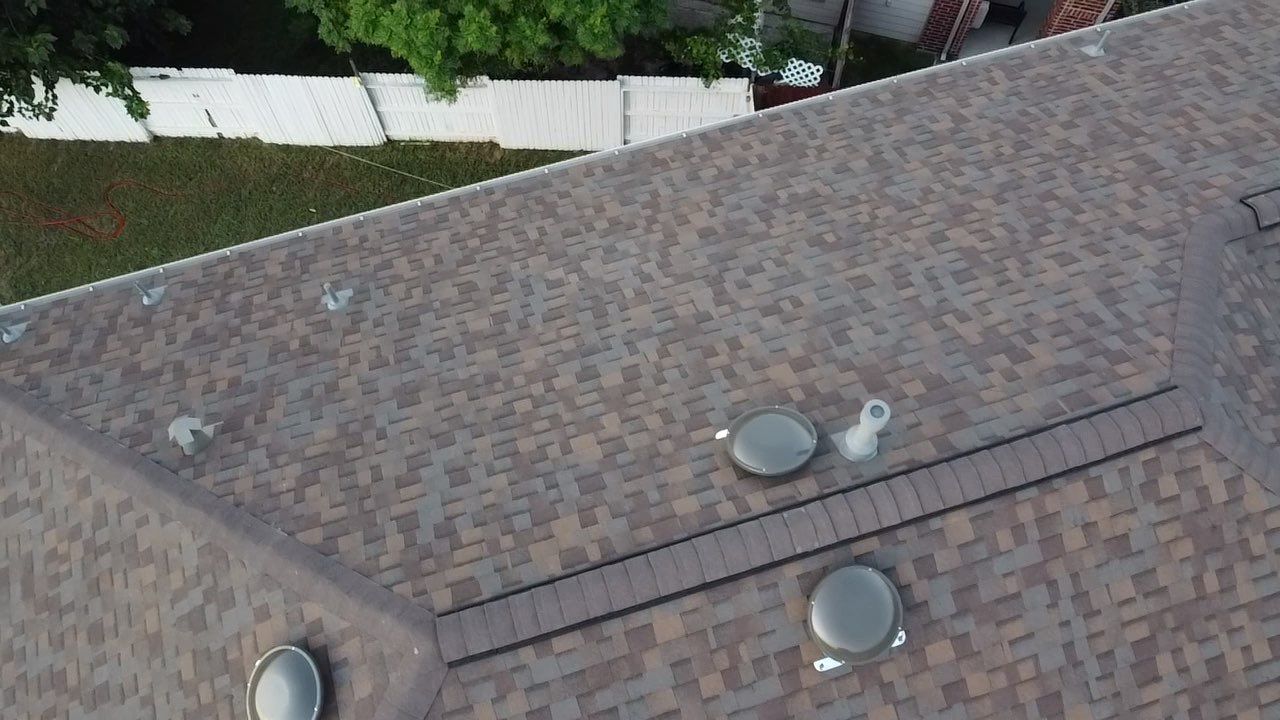 Owens Corning Shingle Roofing Replacement for Houston Two-Story Home by Houston Roofing & Construction