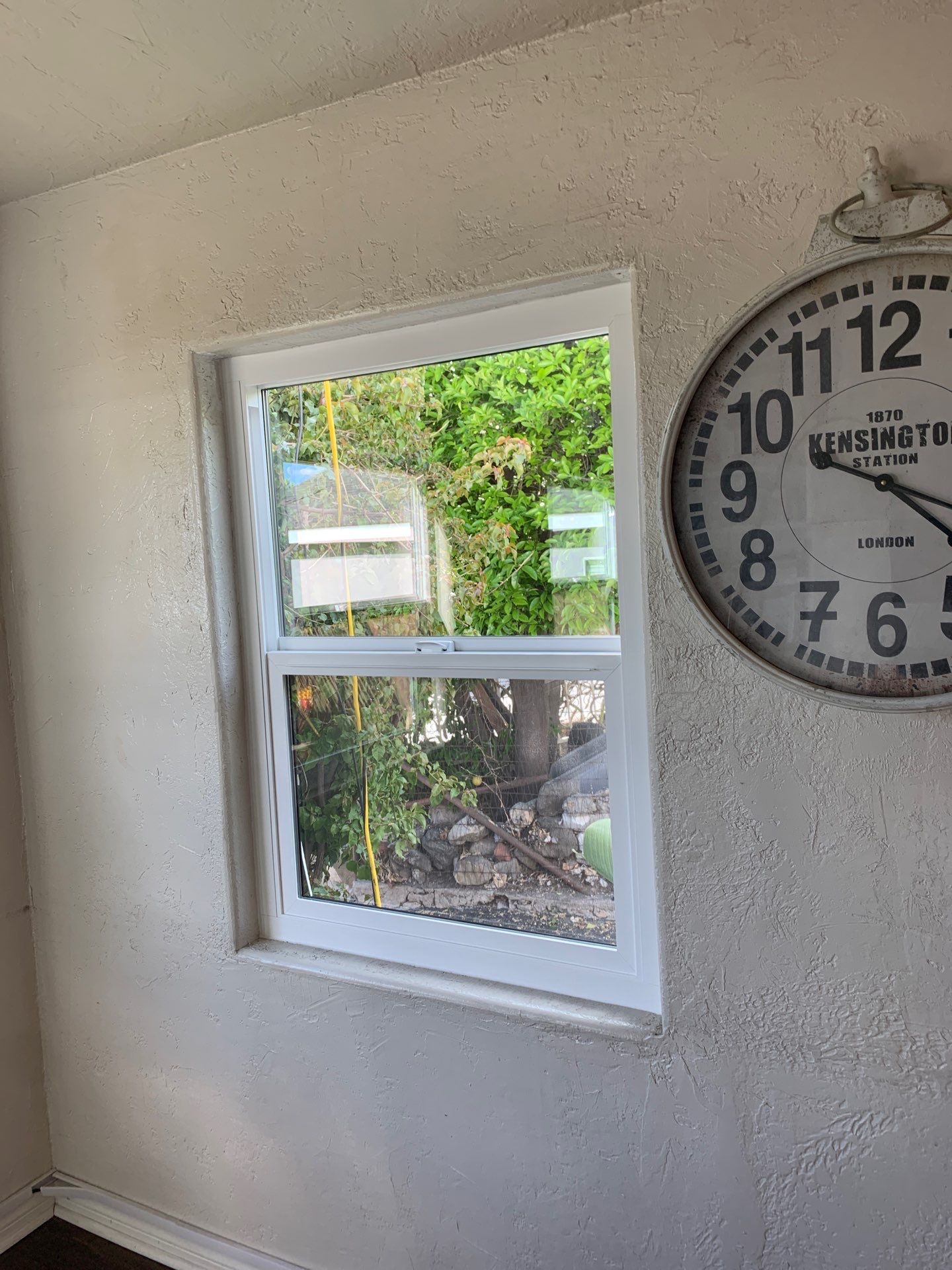Window Installation using Black Anlin windows by American Window Company