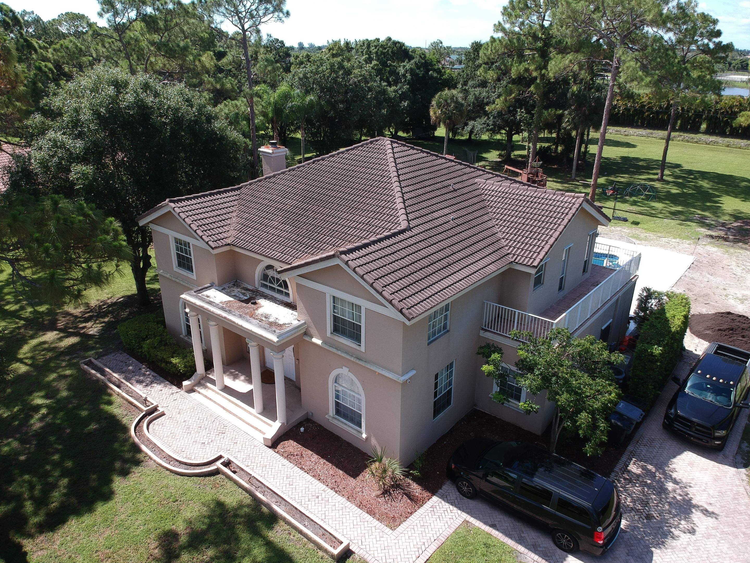 Residential Roofing Installation using 1" Nail strip metal roof by BLUES BROTHERS CONSTRUCTION CORP