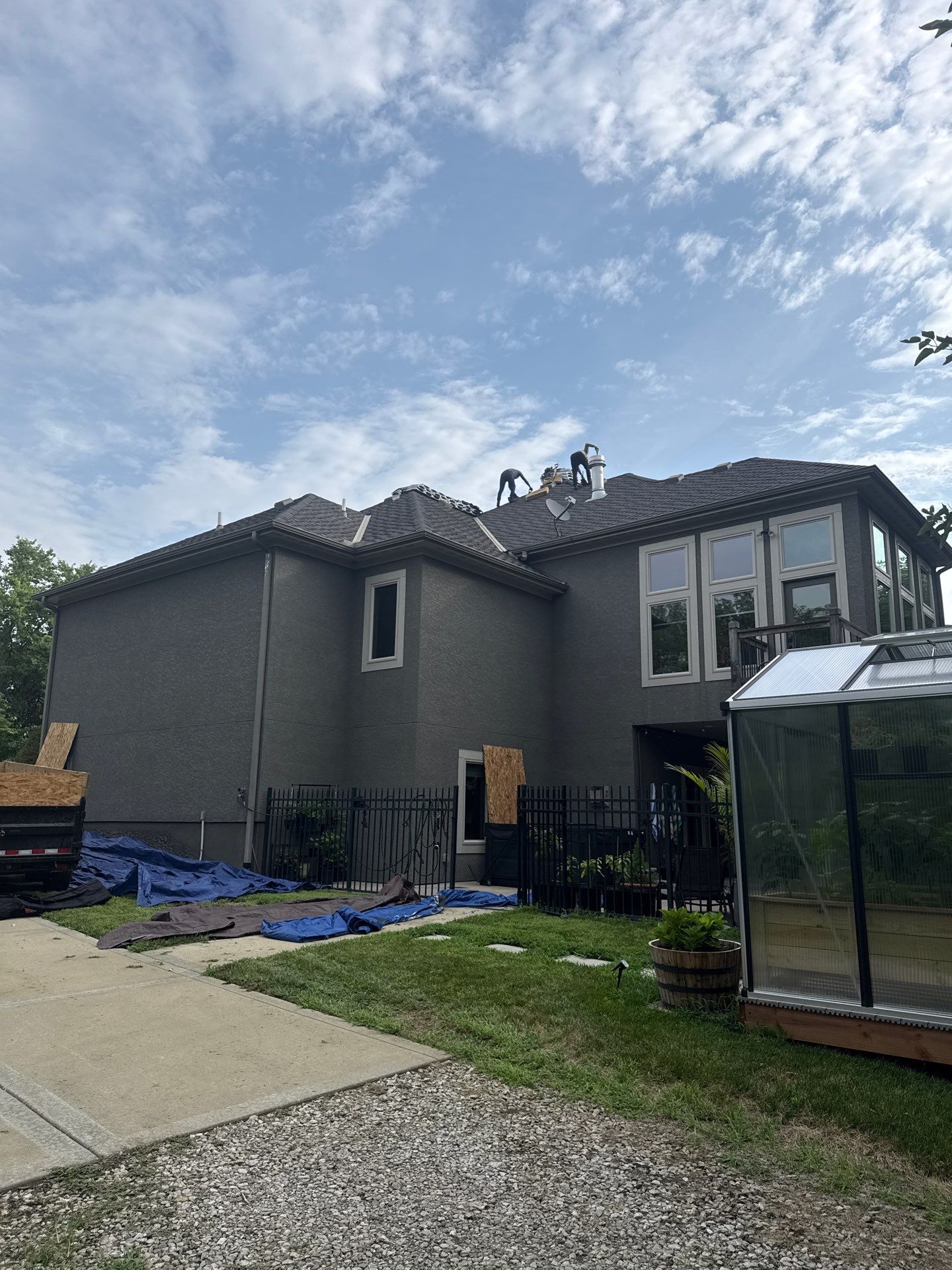 Rustic Black roof by Victor Construction
