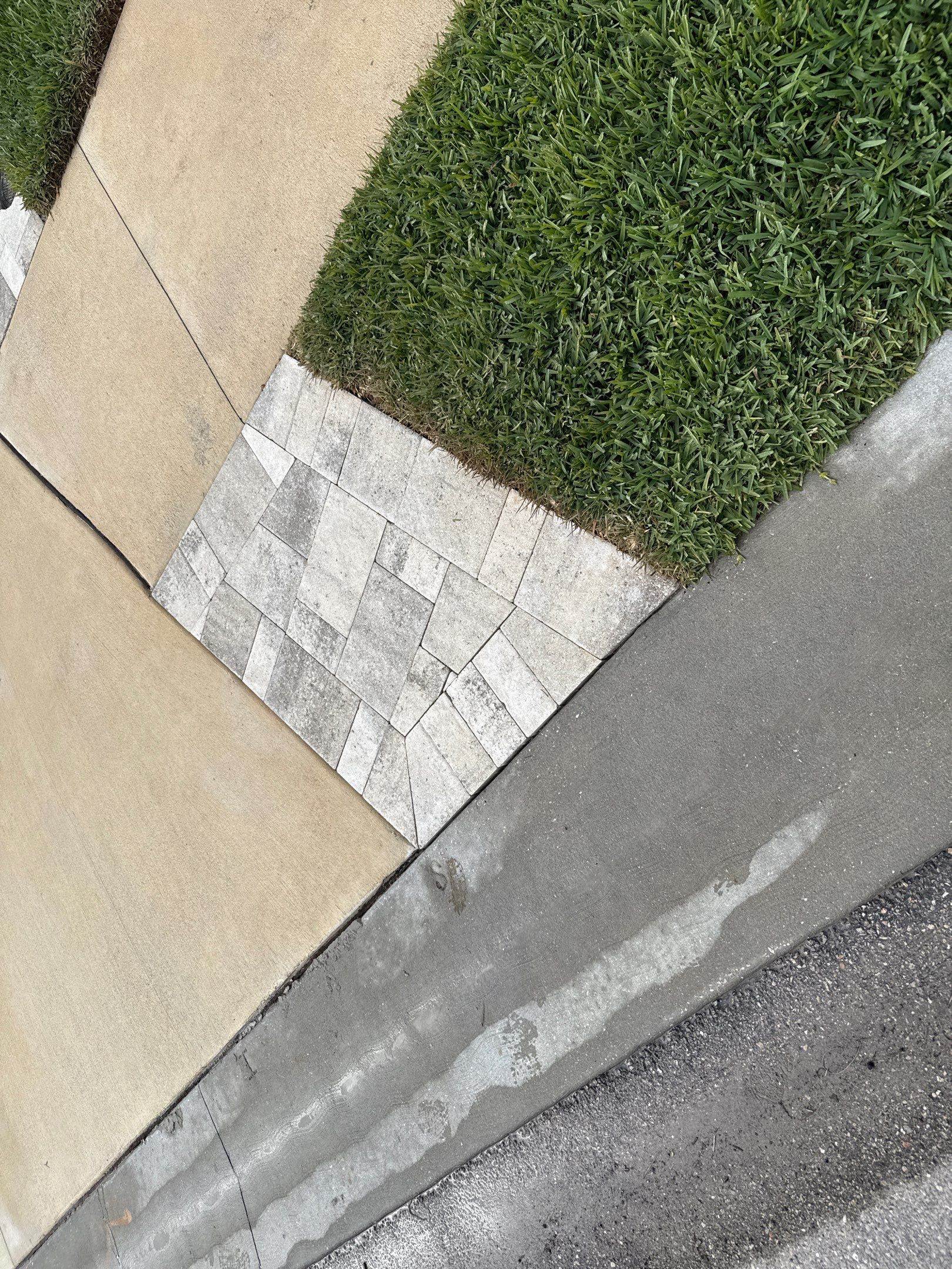 Rust Stain Removal from Concrete Driveway and Pavers in Park East at Azario | Lakewood Ranch, FL by Sunshine AquaWash