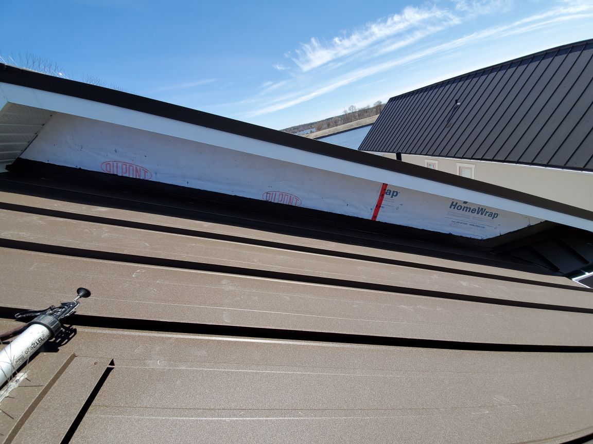 New Home Construction using 16" Standing Seam Panels by Jay Carter Roofing & Sheet Metal