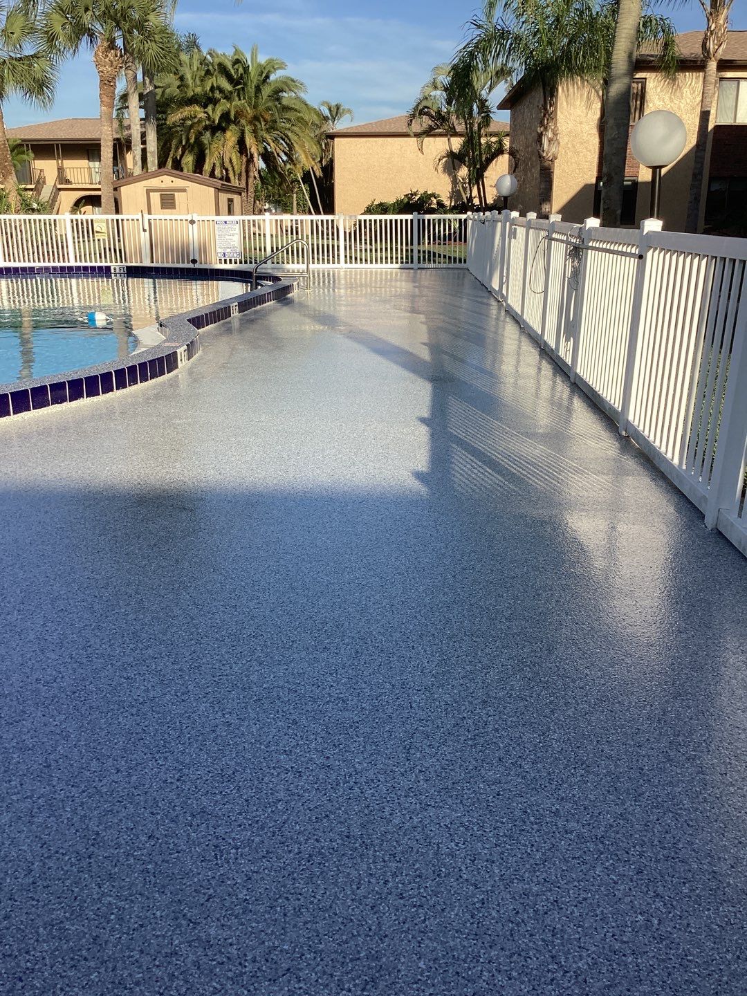 Pool Deck using Orbit and Tidal Wave by Amvet concrete coatings llc