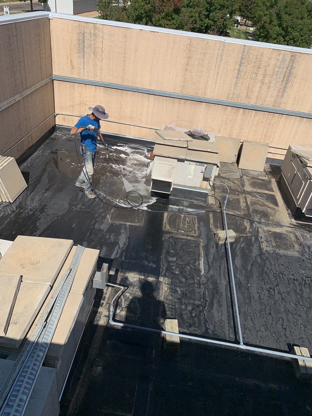 Commercial Roofing Installation using American Standard Coating - S  by A to Z Roofing