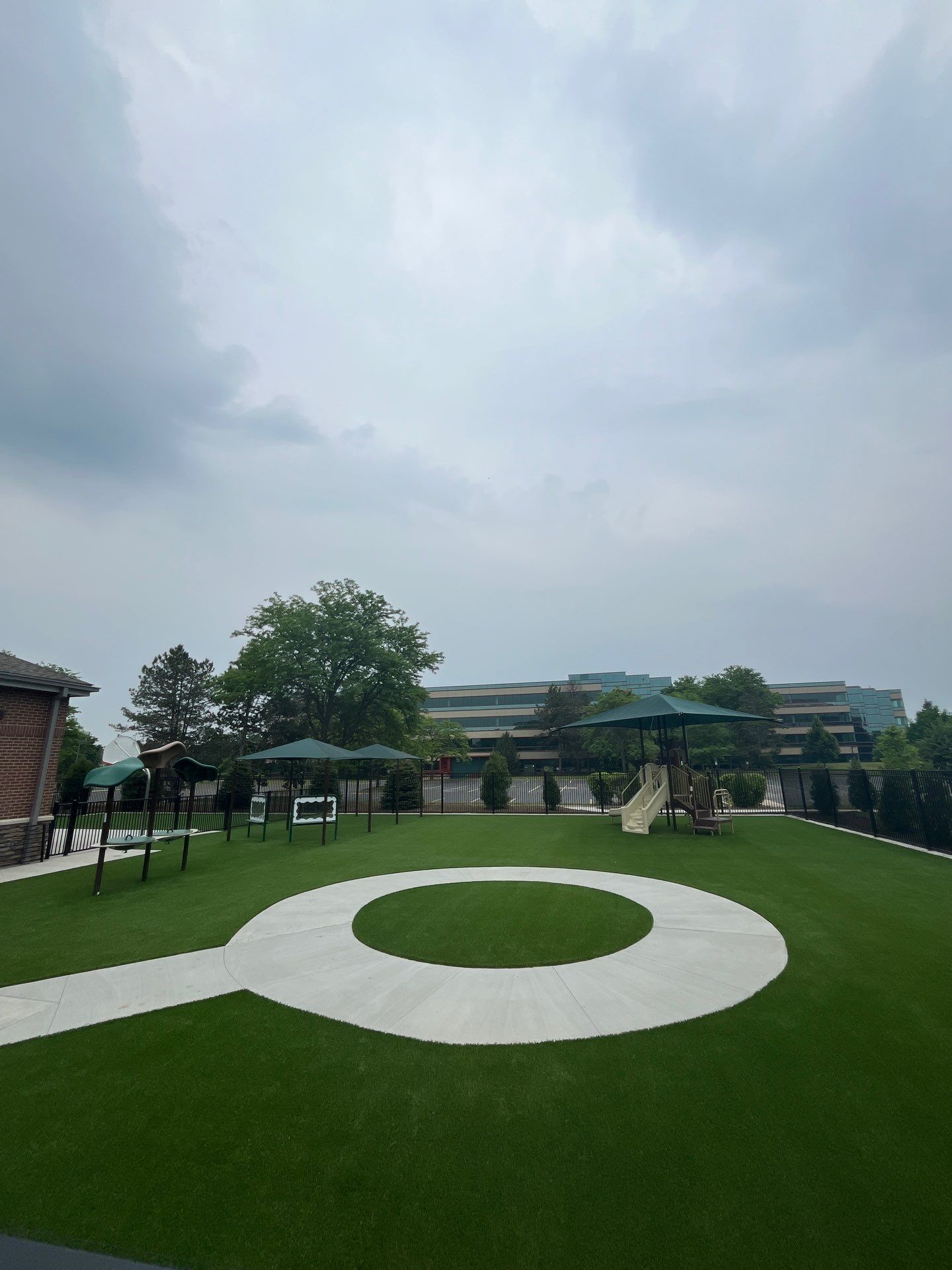 KinderCare of Lincolnshire Commercial Playground Turf Installation by Southwest Greens Midwest