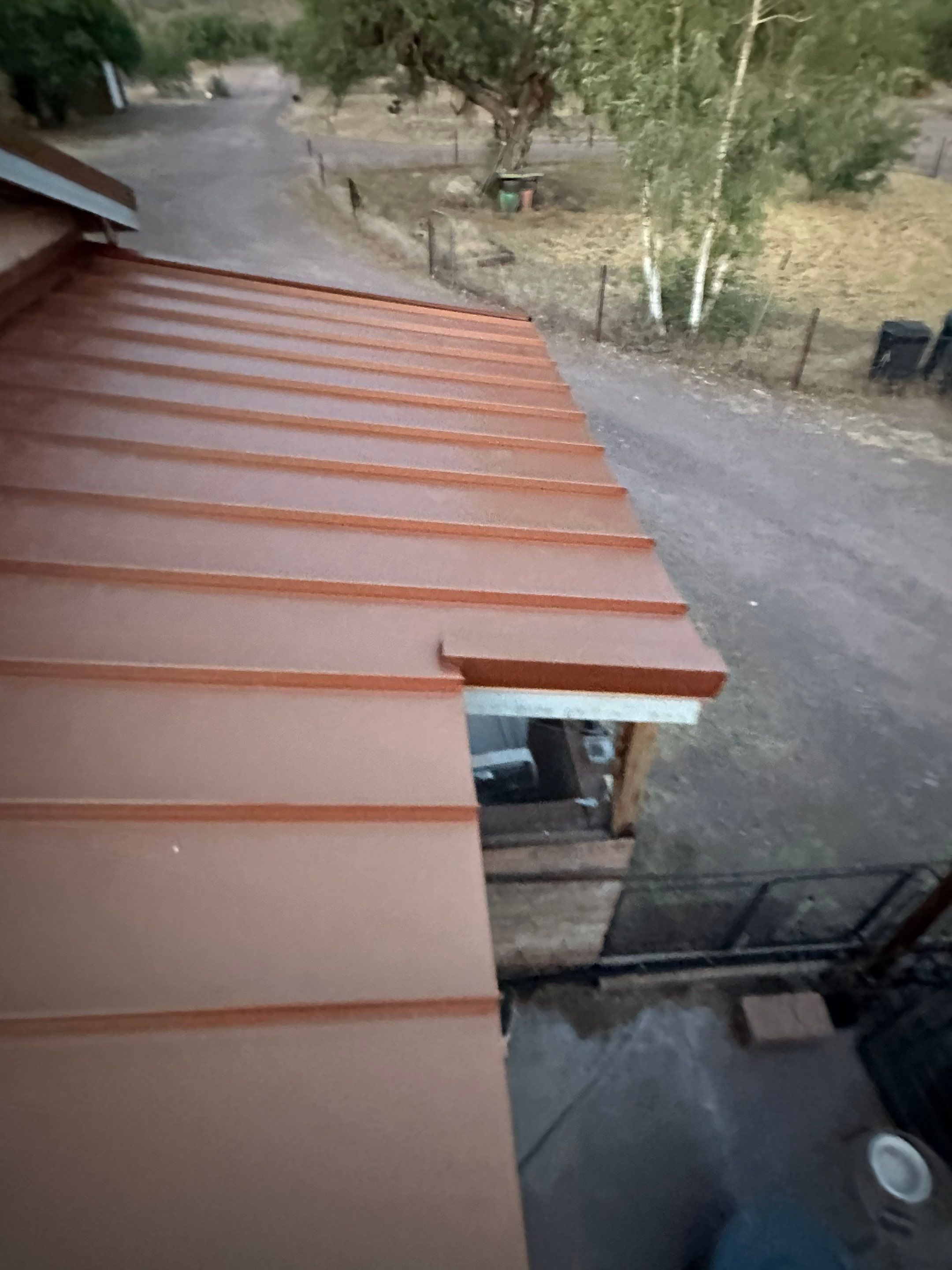 Bronze Standing Seam by Reimagine Roofing