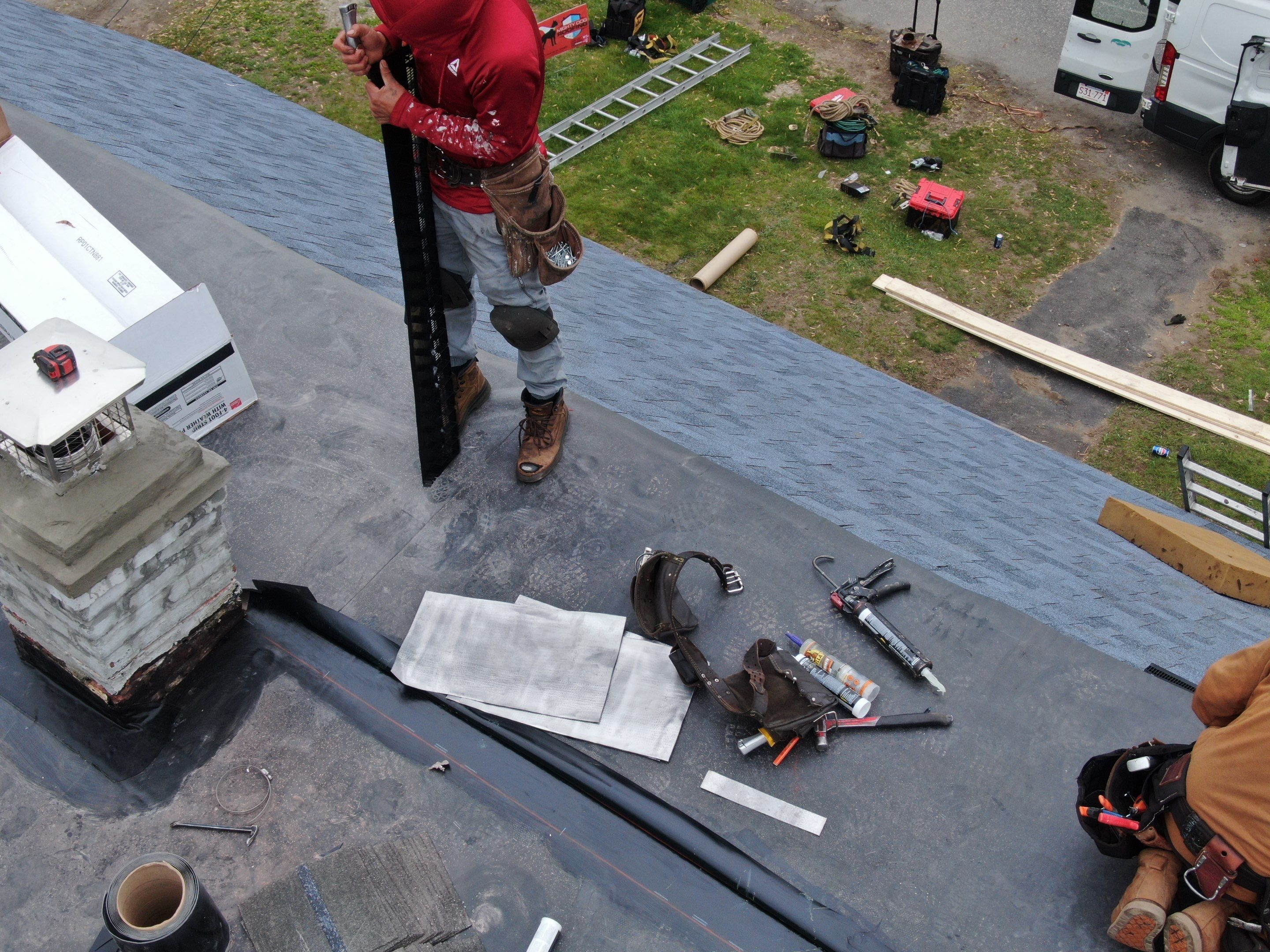 Roof and Flat Roof Membrane Replacement in Lowell, MA by Mighty Dog Roofing of Greater Middlesex County